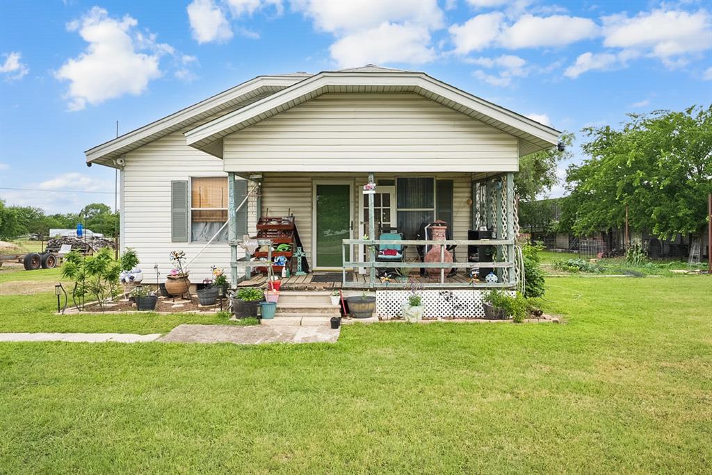 Rare opportunity to own a versatile property with both commercial and residential use potential in the growing Weatherford area. Located directly on highly traveled Tin Top Rd with excellent visibility and accessibility, this property is ideal for investors, business owners, entrepreneurs, or buyers seeking live work flexibility.

The property features a residential home along with a substantial 30 x 30 shop building with a one car bay and additional interior space for vehicles, equipment, storage, or workshop use. An attached covered carport provides parking for up to 3 vehicles.
Located in an area allowing commercial and residential use, this property offers excellent potential for business, office, workshop, storage, mixed-use, investment, or continued residential use. Buyer to independently verify all intended uses, zoning, restrictions, utilities, permits, and development requirements.

Conveniently located with quick access to I-20, Weatherford, and Fort Worth, this property combines visibility, functionality, and long-term potential.