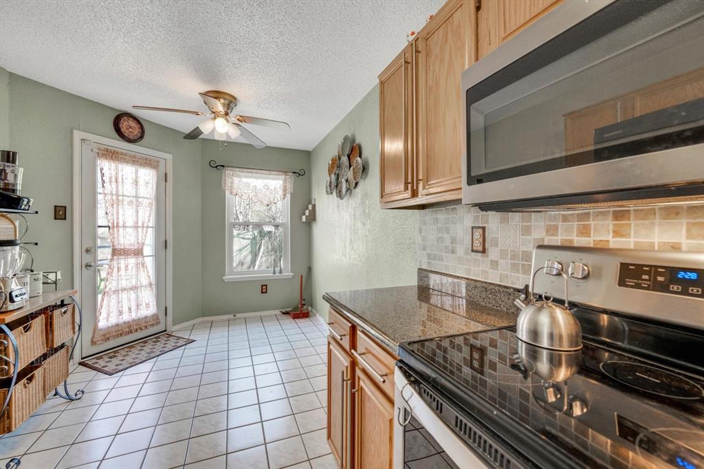 Wonderful Home in Keller ISD. NO HOA!!! Close to schools shopping. House is clean and ready for a new owner.
Bathrooms are updated and beautiful! Soaring ceilings downstairs. Most windows updated. Refrigerator, washer and
dryer, and other items are negotiable. Beautiful granite countertops. High ceilings. Check out the pics. Survey is
available.