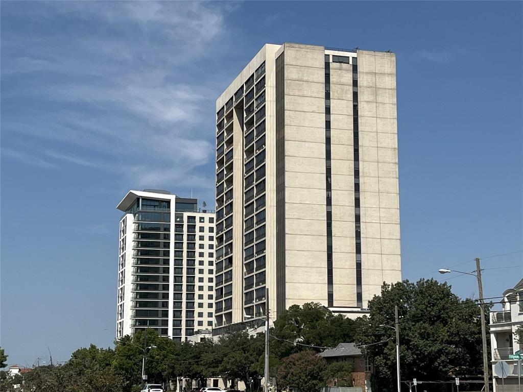 Welcome to the Athena, a full-service high-rise condominium and distinguished Preston Hollow luxury landmark. Unit #918 features a spectacular 180 degree south-facing view of Downtown Dallas and Park Cities. It has two large living areas, two spacious bedrooms, and an abundance of closets and storage. Custom cabinetry and woodwork throughout. Formal dining area, plus a built-in seating breakfast area. Two and a half bathrooms. Classic bar with refrigerator and sink. The building is conveniently located near outstanding retail centers, restaurants, Park Cities, and downtown Dallas. HOA dues cover comprehensive utilities, plus internet and WiFi in the unit and access throughout the property, cable television, security, concierge staff, in-house management and maintenance, grand lobby, assigned garage parking and storage unit, gym facilities, a large indoor heated saltwater pool, entertainment rooms, and additional amenities. Perfect 'Lock and Go' living for those that travel. The new 2026 Tax Appraised Value is $574,020. Please note that estimated taxes are shown without exemptions. The Athena maintains a smoke-free environment and does not permit pets. This prized corner unit offers tranquil living and impressive views, especially at SUNSET... come see Mother Nature's light show and Downtown sparkle.