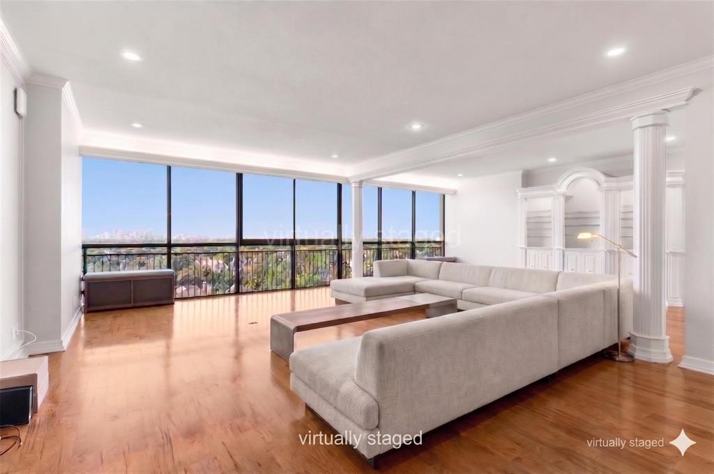 Welcome to the Athena, a full-service high-rise condominium and distinguished Preston Hollow luxury landmark. Unit #918 features a spectacular 180 degree south-facing view of Downtown Dallas and Park Cities. It has two large living areas, two spacious bedrooms, and an abundance of closets and storage. Custom cabinetry and woodwork throughout. Formal dining area, plus a built-in seating breakfast area. Two and a half bathrooms. Classic bar with refrigerator and sink. The building is conveniently located near outstanding retail centers, restaurants, Park Cities, and downtown Dallas. HOA dues cover comprehensive utilities, plus internet and WiFi in the unit and access throughout the property, cable television, security, concierge staff, in-house management and maintenance, grand lobby, assigned garage parking and storage unit, gym facilities, a large indoor heated saltwater pool, entertainment rooms, and additional amenities. Perfect 'Lock and Go' living for those that travel. The new 2026 Tax Appraised Value is $574,020. Please note that estimated taxes are shown without exemptions. The Athena maintains a smoke-free environment and does not permit pets. This prized corner unit offers tranquil living and impressive views, especially at SUNSET... come see Mother Nature's light show and Downtown sparkle.