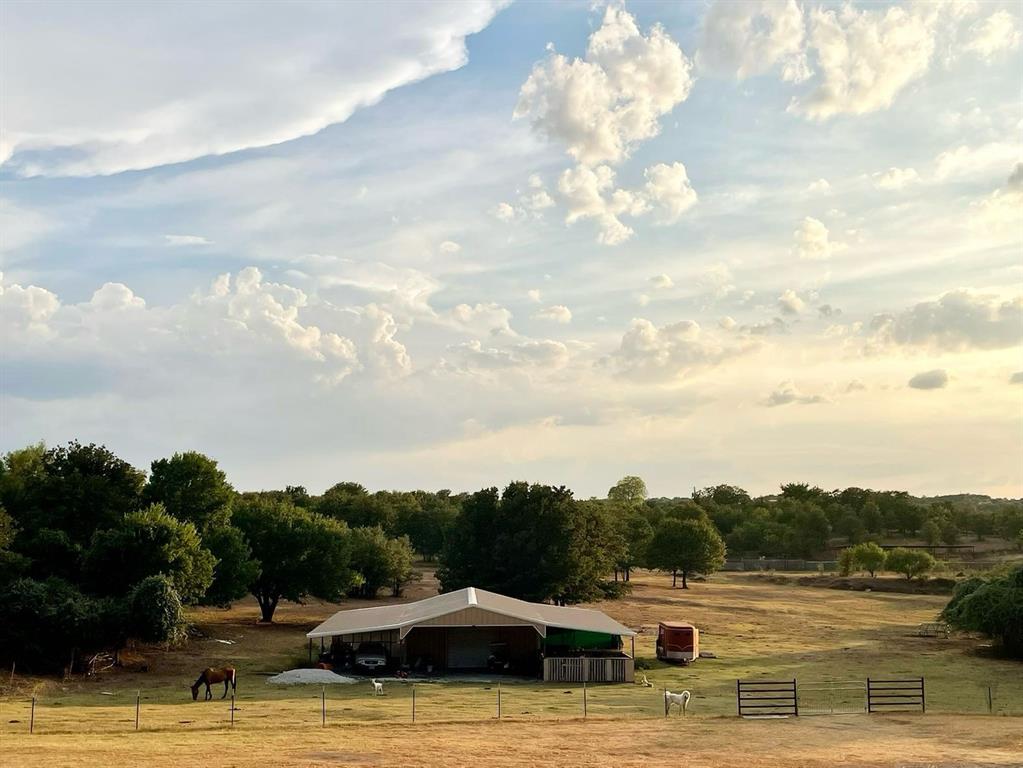 Wonderful Land with Lots Of Possibilities!!! 25+ Acre Property. Divided in to 4 tracts to be sold all together or separate. Tract 26 has a Horse Rodeo Arena with Grandstand. Come have your rodeo events here and or build your dream home(s). Property has lots of trees, pastures, ponds, fairly new workshop, and 6 horse stables that need some love. Bring your imagination to life! . . . Tract 26 has 12.384 acres. Tract 27 has 1.259 acres. Tract 28 has 1.248 acres. Tract 29 has 10.179 acres. Tracks 30, 31, 32 & 33 are currently being sold separately with a Home on Track 30, but they can all be sold separately. Tract 30 has 1.241 acres. Tract 31 has 1.029 acres. Tract 32 has 1.096 acres. Tract 33 has 1.186 acres.