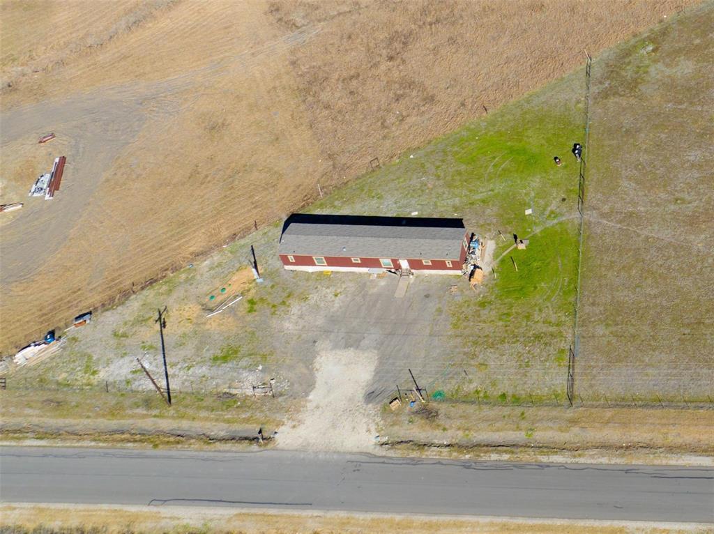 1.58 cleared acres of Prime land location, 30 minutes from downtown Dallas, no restrictions great to build your dream home or to bring a double-wide mobile home. Septic, sewer and electricity connected on property, don't let pass this great opportunity. Surrounded by mature trees, this serene and private setting offers a beautiful natural canvas to create the home you've always envisioned. Enjoy the peaceful country atmosphere while being conveniently just minutes from Downtown Dallas.
manufactured home belongs to tenant, please do not disturb tenants.