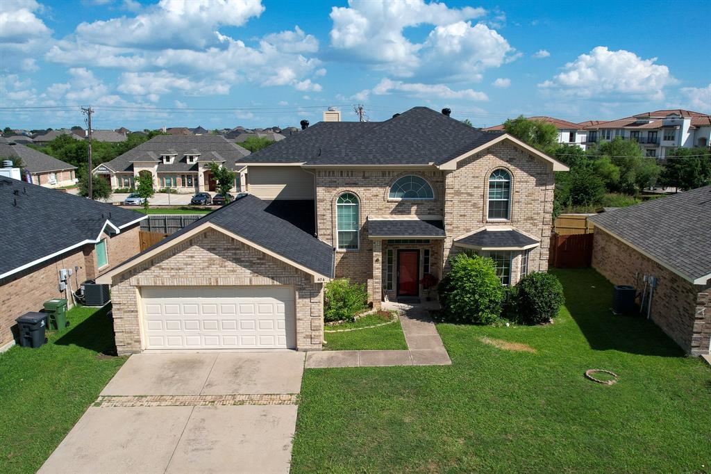 Priced to sell Quickly! Welcome to this exceptional four-bedroom home with three & a half bathrooms. Move-in-ready & located in A+ Mansfield ISD, this beautiful home offers natural light & open concept! Downstairs features a spacious living room with ceiling fans & fireplace, formal dining, & a gourmet chef's kitchen with gas cooktop, breakfast nook & sprawling island. The first-floor primary suite offers privacy, dual vanities, soaking tub, walk-in shower & expansive walk-in closet. Upstairs, you will love the open family room, three additional bedrooms with fresh carpet & ensuite bathroom! Situated on an oversized lot, the sprawling backyard is perfect for entertaining & family memories. No HOA fees. Located in the highly-rated Mansfield ISD A+ school district with convenient access to Highways 287, 360, and I-20. Close to DFW Airport, shopping, the Dallas Stadium & entertainment. Don't wait—move in before school starts.