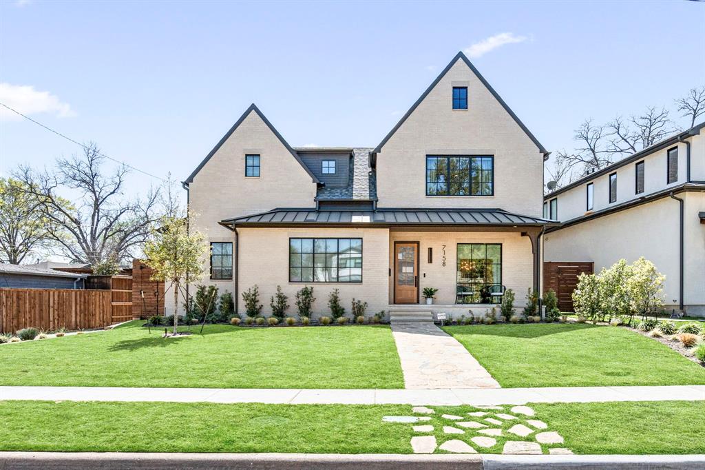 Situated in the heart of Lakewood, this exquisitely crafted home by Montgomery Custom Homes was completed just last year and is the epitome of elegance and sophistication. Upon entering, you'll be welcomed by chic herringbone inset flooring that leads to a spacious dining room, accentuated by custom millwork, elegant wallpaper, and a striking focal light fixture. The unique and efficient floorplan boasts a butler’s pantry-prep kitchen, equipped with custom cabinetry, double ovens, an ice maker, and two refrigerated beverage drawers—perfect for meal prep and entertaining. The open-concept kitchen, resplendent with Taj Mahal quartzite, is beautifully complemented by custom rift-cut white oak cabinetry and a luxury appliance package from Thermador and Gaggenau (note: the cooktop is also plumbed for gas). Surrounded by a wall of windows and doors, the kitchen flows seamlessly into the cozy breakfast room with a built-in bench and a stunning family room that overlooks the sparkling pool and lush landscaping. The family room features double vaulted ceilings, additional windows for abundant natural light, and a stone-framed gas fireplace with remote control. The primary suite, located downstairs, offers a luxurious retreat with Negresco honed tambour fluted granite, Victoria + Albert tub, custom closet system with cabinet doors and drawers, as well as a unique-rare ensuite private office. Upstairs, three bedrooms and a playroom each have their own bathroom with designer tile selections like Walker Zanger. Separate gym or fifth bedroom, along with an office and bath, is located off the porch and accessible via a separate staircase, making it ideal for a mother-in-law suite. Outdoors, an oasis awaits with a covered porch featuring an Isokern fireplace, a resort-style pool, and lush landscaping. Conveniently located just steps from Tokalon Park and the White Rock Lake trail, don’t miss your opportunity on this exceptional custom Lakewood home!