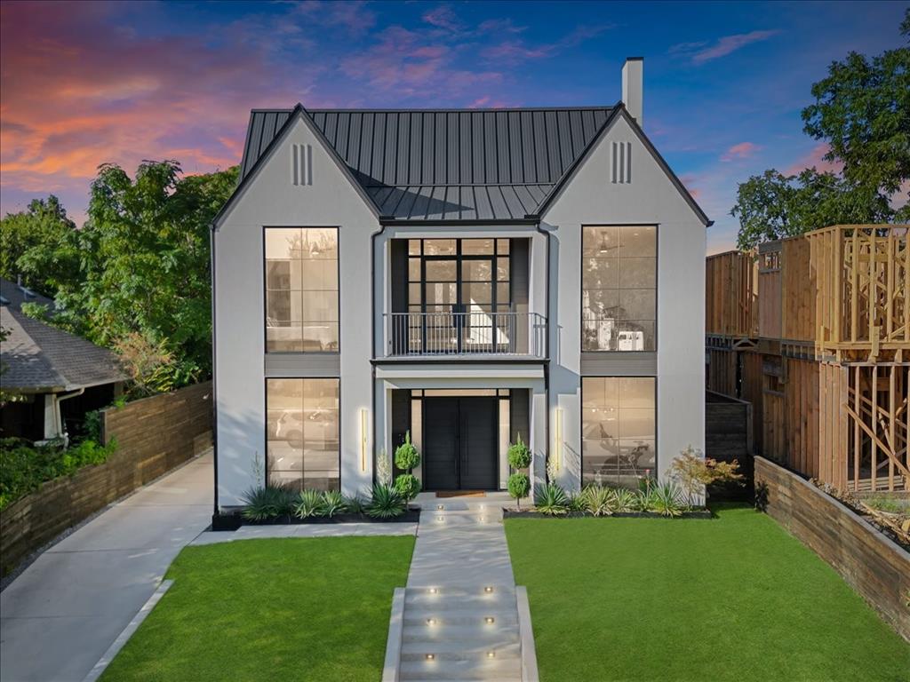 Architecturally striking custom built transitional home, in the heart of one of the most sought after neighborhoods in Dallas.  Nestled on an elevated, oversized lot, just steps away from Lower Greenville and neighboring Lakewood.  With over 6,000 square feet of under roof space this home truly has it all!

Upon entry you cannot help but be impressed by the great room with soaring 30 foot ceilings, anchored by the statement gas fireplace, museum finished walls and oversized glass patio doors that transport you from the indoor space to the backyard sanctuary.  Natural light is in abundance and flows throughout this carefully planned home.

Entertain effortlessly with a custom chefs kitchen with dual islands, equipped with Thermador commercial grade appliances connects perfectly to the Butlers Pantry and Bar, providing the ultimate gathering place for friends and family.  

Floor to ceiling glass doors open to the outdoor resort style amenities with a heated pool, meticulously maintained artificial turf and a large outdoor kitchen equipped with grill, griddle and pizza oven.  Ideal for game day, late night swims and weekend grilling.

A privacy hall with gallery wall, leads to the serene master suite, with his & her walk-in showers, spa bath and expansive walk-in master closet.  Glass patio doors open to provide direct access to the courtyard pool and backyard space.  A discreet main level guest or in law suite, mudroom and perfectly positioned laundry room compliment the remainder of the first floor.

Upstairs boast two additional bedrooms with ensuite bathrooms and walk in closets. A game room and fully equipped media room prewired with a 7.1 Sonos Surround Sound and custom wet bar make for great movie nights with the family.  A thoughtfully designed loft also provides a niche space to enjoy the morning sunrise or your favorite book.

Don't miss the chance to own this exceptional, truly one of a kind home!