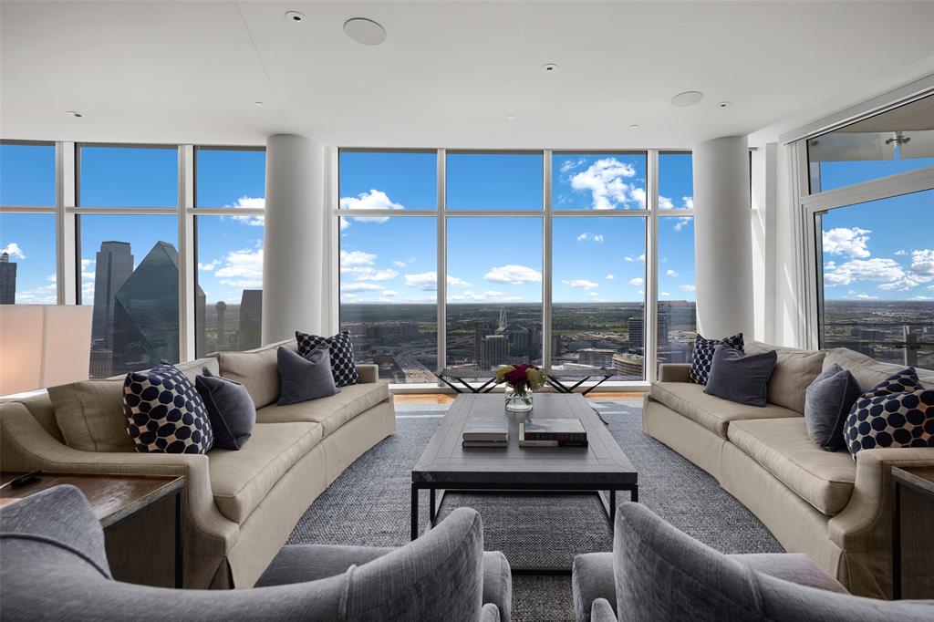 Enjoy magnificent sunrises and sunsets from this stunning 39th floor home in iconic Museum Tower.  Unparalleled panoramic views capture the dramatic skylines and landmarks of both Uptown and Downtown Dallas.  This rare home occupies a spacious half floor with 10’ ceilings throughout and private elevator access into the home.  Custom, luxurious finishes include walnut hardwood floors by French Brown, Phillip Jeffries wallpapers, Waterworks fixtures, Bardiglio and Palisandro marbles, and Blue Iceberg calcite.  Kitchen features Gaggenau appliances including microwave, warming drawer, double ovens, separate steam oven, dual dishwashers, refrigerator-freezer, and wine refrigeration.  Lutron HomeWorks lighting and automated shades.  Control 4 media system and climate control throughout.  Ideal location overlooking beautiful Klyde Warren Park, the Pritzker Prize-winning architecture of Dallas Arts District’s performance venues and museums, and numerous restaurants.  Available fully furnished.