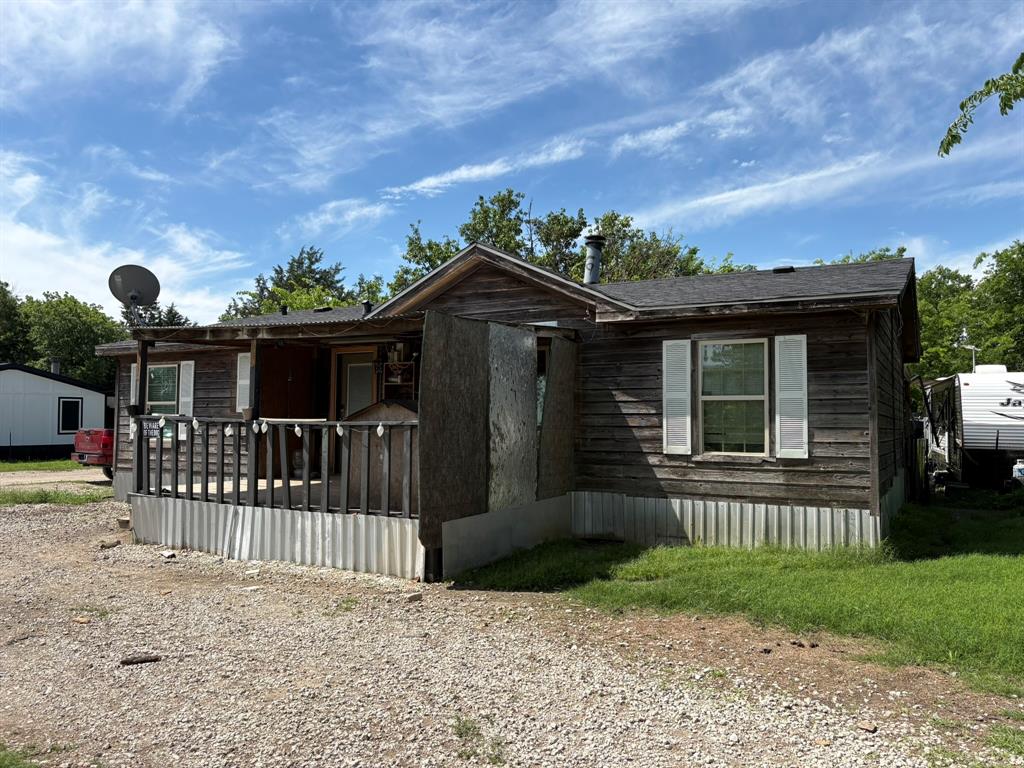 two lots on this land with a cedar mobile home on it in the city of Palmer