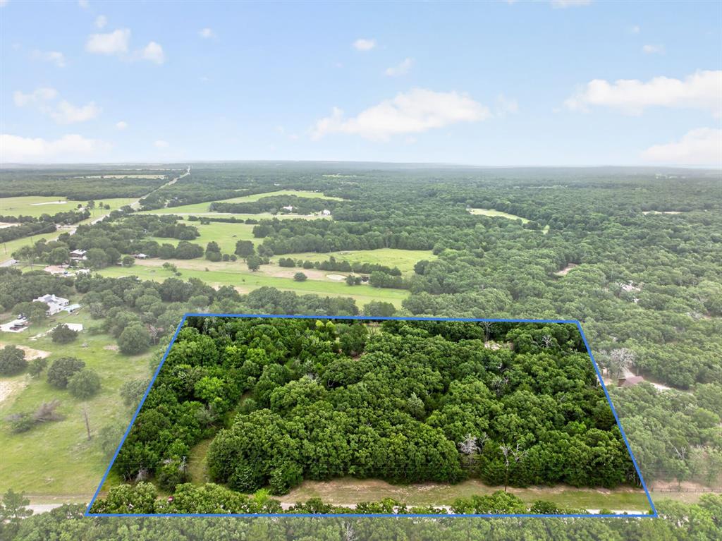 BUILD YOUR DREAM HOME HERE!

Nestled in the highly sought after Poetry area, this beautiful 4.383 acre property offers the perfect opportunity to build the custom home you've always envisioned. Mature trees are scattered throughout the land, creating a picturesque setting with exceptional privacy, natural beauty, and endless possibilities for your future homesite.

Located just outside the city limits, you'll enjoy the peace and tranquility of country living while remaining conveniently close to modern amenities. With I20 just minutes away, Rockwall approximately 25 minutes away, and Dallas within 45 minutes, this property provides the ideal balance of seclusion and accessibility.

As the only remaining undeveloped lot in Woodland Estates, this property presents a rare opportunity to build in an established community surrounded by beautiful custom homes and large acreage properties. Whether you're planning a custom home, workshop, space for animals, or simply a private retreat to enjoy nature and abundant wildlife, this property offers the space and freedom to make it your own.
Opportunities like this are becoming increasingly difficult to find. Come walk the property and see for yourself what makes it so special.