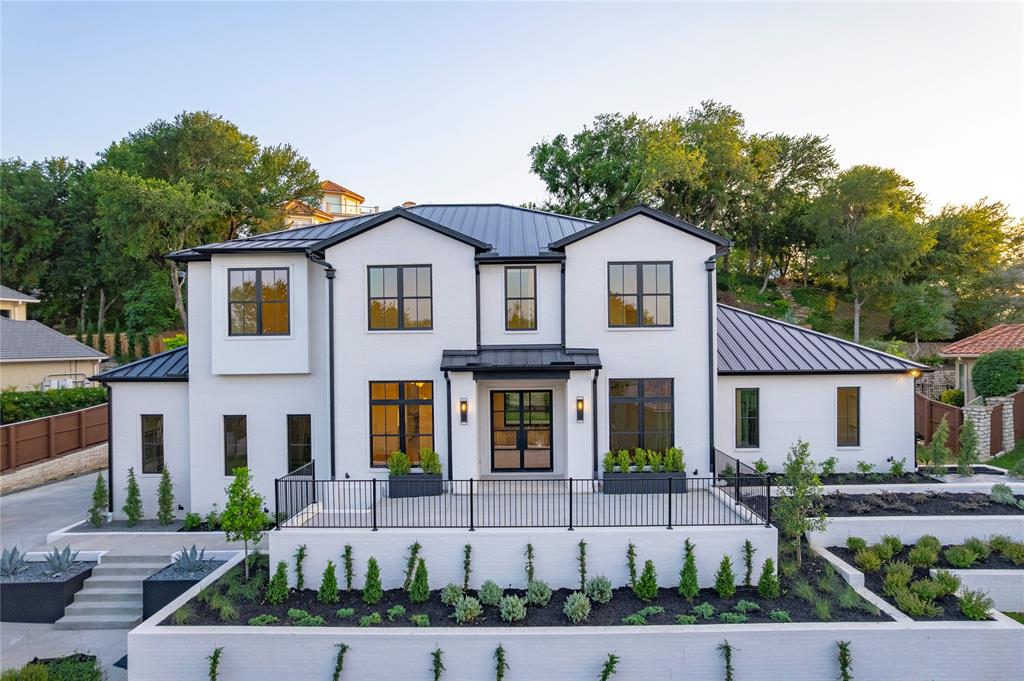 Welcome to this exceptional modern farmhouse nestled within the gated community of Mira Vista Country Club. Thoughtfully designed with timeless finishes and a spacious, open-concept layout, this home offers 5 bedrooms, including 4 with en suite baths. The chef’s kitchen is the heart of the home, featuring top of the line appliance, a large island, and ample prep and storage space—all seamlessly connected to the expansive living room with a striking fireplace and sliding doors that lead to a covered patio and lush backyard. The primary suite is a true retreat, boasting dual vanities, separate walk-in closets, and a spa-like atmosphere. Upstairs, enjoy a media room, game room, and three additional bedrooms. An oversized three-car garage completes the home, offering generous space for storage and functionality. With its clean modern farmhouse architecture and rare combination of layout, location, and design—this property is a standout in Mira Vista.