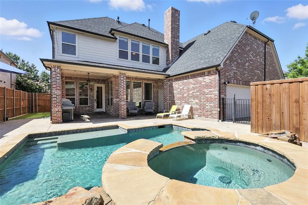 This exquisite 5-bedroom, 4.5-bath custom home by renowned builder Jeff Pfeifer offers luxury living at its finest. Located in a sought-after Frisco neighborhood, this home features an ideal layout with the primary suite downstairs and four spacious bedrooms upstairs—each with walk-in closets. One upstairs bedroom features a private ensuite bath, while two share a convenient Jack & Jill setup.

Step into the elegant dedicated office with built-in cabinetry and a coffered ceiling, then enjoy movie nights in the media room or entertain in the game room with a wet bar. The heart of the home is the kitchen, complete with granite countertops, hardwood cabinetry, a large island, gas cooktop, double ovens, walk-in pantry, and butler’s pantry.

The living room showcases hand-scraped hardwood floors, a beautiful stone gas fireplace, and even a wine grotto. The primary suite is generously sized with his-and-hers closets, while the laundry room includes built-ins, a sink, and a practical drop zone.

Step outside to your private backyard oasis featuring a pool, outdoor kitchen, electric gate leading to a three-car garage and a turfed area for pets or play.

Neighborhood amenities include a community pool, hiking and biking trails, and Falcons Field Park, which offers a basketball court, playground, BBQ area, and practice fields. Zoned to highly rated Boals Elementary and Lone Star High School, and just minutes away from schools, PGA Headquarters, The Star, Dallas North Tollway and so much more.

This home truly has it all—luxury, space, functionality, and location.
