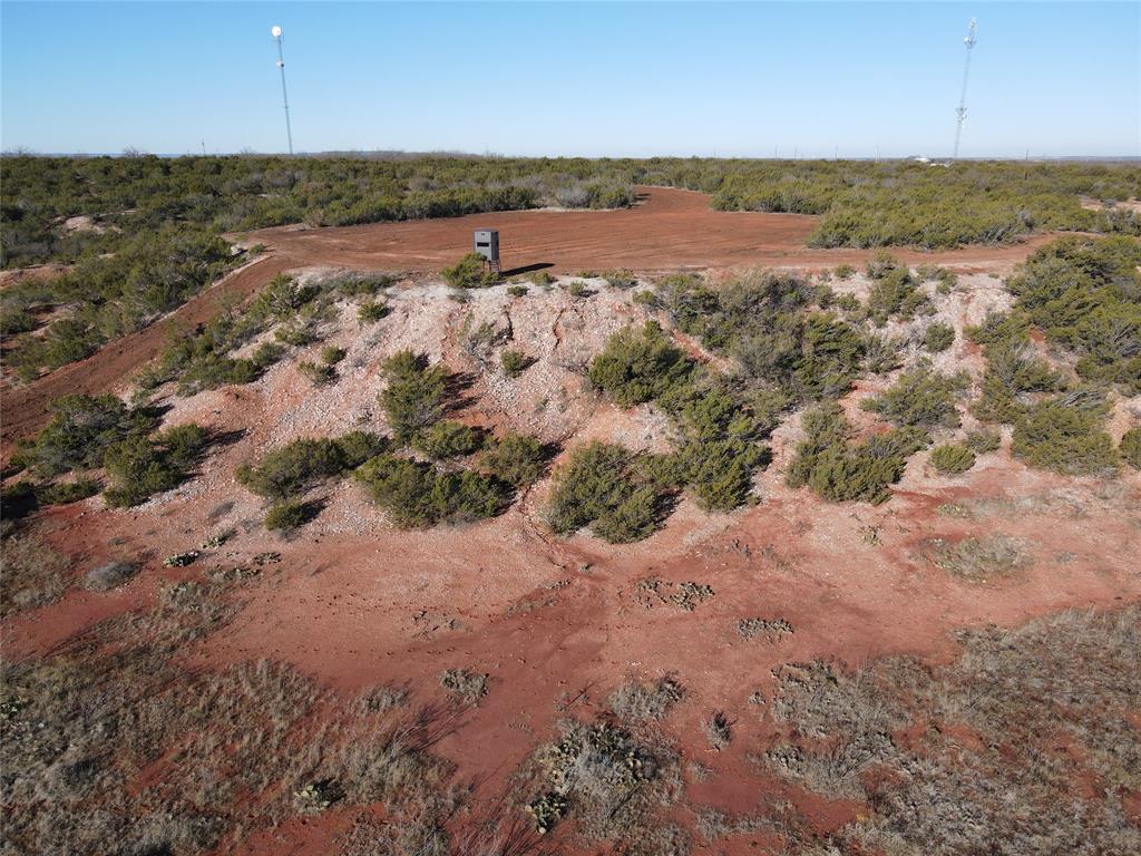This 80 acres arguably contains the most stunning and desirable homesite in the Big Country. Seated on top of a plateau facing the neighboring mountains of Buffalo Gap while looking over a private 4 acre lake, this is a view you have to see to believe. This ranch is located less than 5 minutes outside of Abilene City Limits! Many Abilene residents have deemed this lake as the best duck hunting in Abilene. The lake is also stocked with fish. Other wildlife abounds here as well. Internal ranch roads and elevation throughout.Minerals convey. Paved road frontage to each tract, and utilities are at the road.There is additional acreage available.
Pricing+Tract Info:

Tract 6..18 Acres..$130,000
Home and shop with 53 Acres..$700,000
Home and shop with 15 Acres..$550,0
Tract 9..216 Acres..$669,600