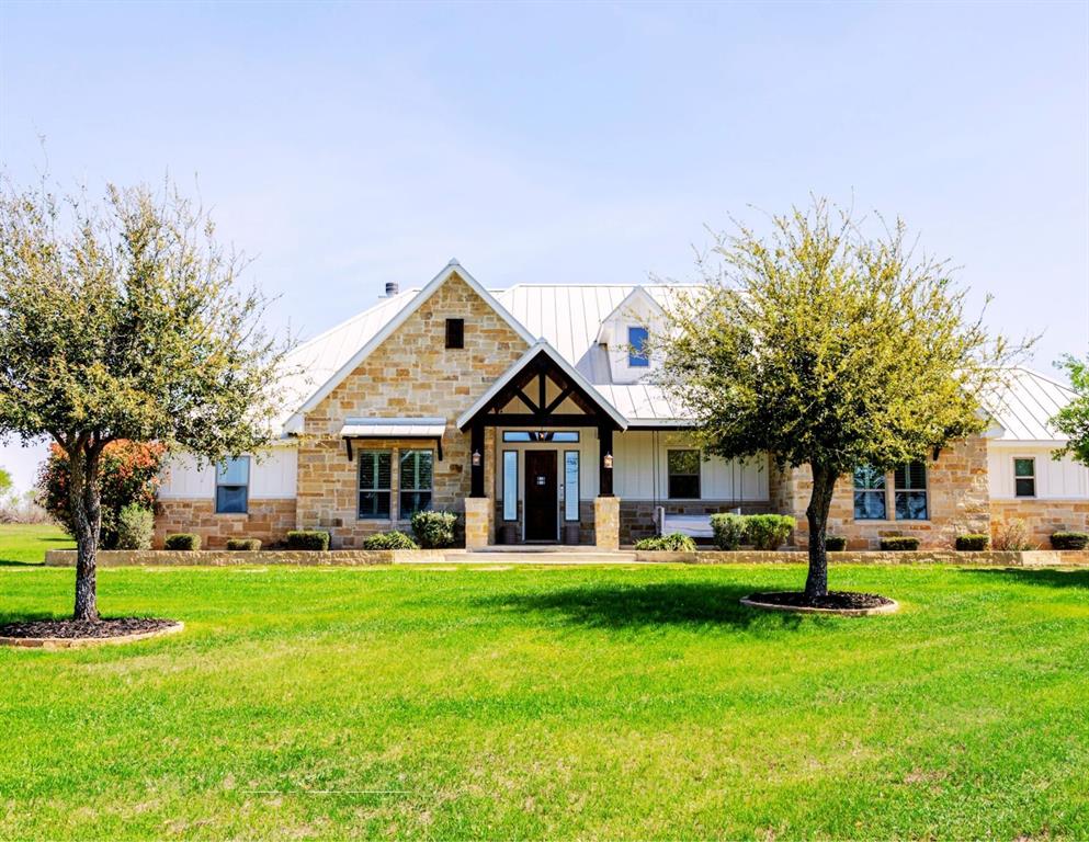 This Show Stopper Has Everything Fully Decorated Custom Interior 3 Large bedrooms, 2.5 Bath, Office, with a Sequestered Master Overlooking the Pond & Fountain, So you can Walk Up Feeling Like a Vegas Winner Every Morning your Feet hit the Ground. You will Love the Mix Stone, Granite, Wood, Windmill Fan, Antler Chandelier, Sauna, & Gas Stove are Nice Rustic yet Classy Touches on this Fully Custom Open Floorplan Home. Amazing Covered Porches with TVs & Outdoor kitchen w, TV to Bring the Inside Party outside to the Oasis Resort Style Pool shaded by 2 Large Palm Trees w, layout deck. You can’t be in Vegas without Security Systems & Cameras surrounding House & Property to keep you safe & to keep an eye on the little ones. 3 Manicured Ponds with Stocked Fish bring Peace, Serenity, & Wildlife to the ranch. Neighbors Fallow Breeding Operation, Overlooking the 4 Stall Concrete Floor Barn w, Tack Room, Non-Solar LED Lighted-Sprinklered 150’ x 200’ feet Riding Roping Arena. Multiple Shop, Storage Buildings. Picturesque Area with wet weather creek feeding a 1-acre Pond for Fishing, Layout Dock, Wells, Old Septic, Electric, Tower Box Blind, Corn & Protein Feeder Create a Wildlife Refuge. On 2 Water Taps SS Water, Septic Systems, Water Wells, Sprinkler Systems, Electric & Fiber Internet thru GVEC, 2 Ac Units with Dehumidifier, Miss Propane Propane. So Much more To see Come look with us before it’s too late. Full 42 Acres with Guest House Available for $2,699,000.00