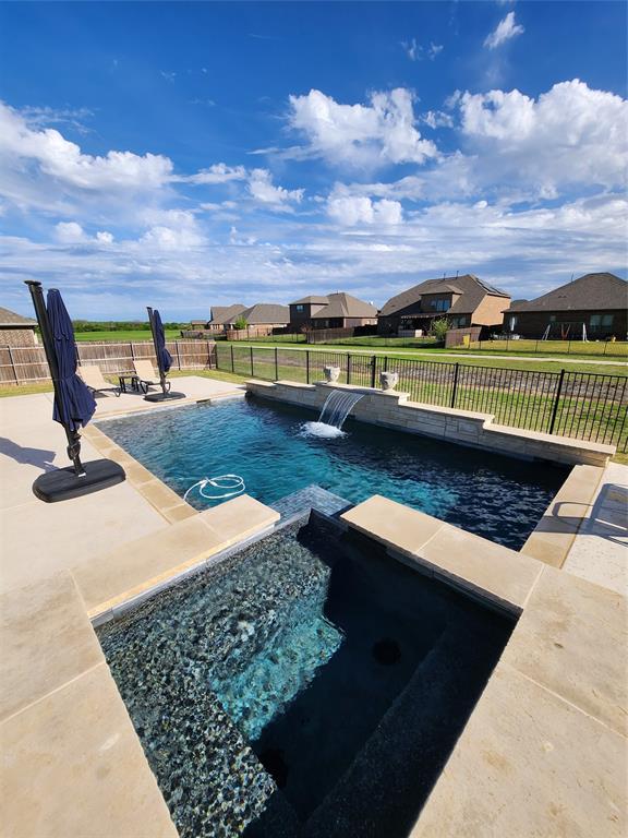 Welcome to your oasis with heated sparkling pool, spa, and covered patio! This immaculate 3-bedroom, 3-bathroom residence offers a perfect blend of contemporary elegance and practical functionality. Step inside the foyer and be greeted by an open concept living space adorned with stylish finishes, including hardwood floors, private office, and game room. The gourmet kitchen boasts granite countertops, stainless steel appliances, and a spacious island, making it a chef's delight. The master suite is a true retreat, featuring a spa-like bathroom with a soaking tub, dual vanities, and a walk-in closet. Two additional bedrooms offer ample space for family or guests, each with access to a well-appointed bathroom. Go upstairs to find a vast flex room along with full bath and bar. The owner will pay for HOA dues, pool maintenance, lawn care and pest control. Do not miss out on this one!