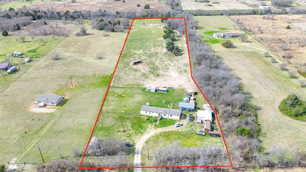 Welcome to your own slice of country paradise! Nestled on 6.329 acres in desirable Mildred ISD, this beautiful manufactured home offers the perfect blend of comfort, space, and functionality. The property is ag exempt and completely fenced and cross-fenced, making it ideal for livestock, hobbies, or simply enjoying wide-open country living. You’ll love the abundance of improvements, including multiple outbuildings, a spacious shop, and RV storage, providing plenty of room for equipment, projects, and recreational vehicles. A gated entrance adds privacy and security while the expansive acreage gives you the freedom to create the lifestyle you want—whether that’s gardening, raising animals, or just enjoying the peaceful surroundings. With room to roam and endless possibilities, this property is perfect for anyone looking to enjoy country living while still being conveniently located near town. Bring your animals, your toys, and your dreams—this property has the space to make it happen!