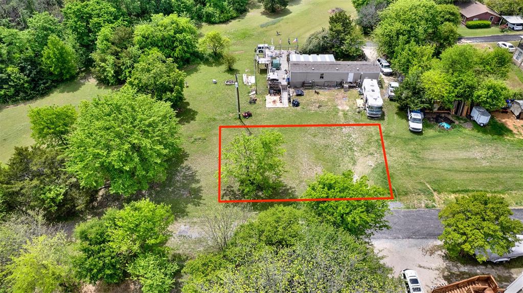 This 0.25-acre lot at 7350 County Road 966 in Nevada, TX offers a perfect balance of rural charm and convenience. Situated in a peaceful, quiet area, the property is easily accessible via State Highway 121 and U.S. Highway 75, providing quick and direct routes to nearby cities, including Dallas. Whether you're commuting for work or seeking local amenities, the location ensures both privacy and practicality. The land to the east is Army Corps of Engineers, providing lifelong access to Lake Lavon, adding an extra layer of tranquility and recreational opportunities. Additionally, septic, water and electricity are available to the site, making it an ideal location for building a home, creating a small hobby farm, or investing in land with future potential. The demand for land in the area is steadily increasing, making this a promising opportunity for buyers seeking long-term value. With its peaceful setting, convenient access to major highways, and potential for growth, this lot offers a great foundation for your next project. To explore how this property can fit your vision, schedule a showing today.