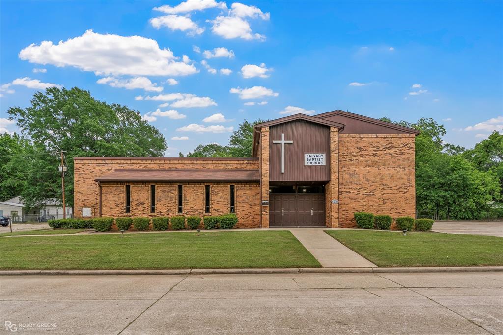 This beautiful complex offers 10820 square feet of well-maintained space situated on over half an acre.  The property features a 400-seat sanctuary, complete with baptismal pool and elevated choir stand, over 14 classrooms, providing a spacious and welcoming worship environment. This site included approximately 150 paved concrete parking spaces, offering ample parking for services and special event. The subject property consists of three lots with the following Caddo Parish Tax Assessments 171423-26-28, 171423-26-24, 171423-35-08.  This versatile property presents an excellent opportunity for continued religious use or potential redevelopment.