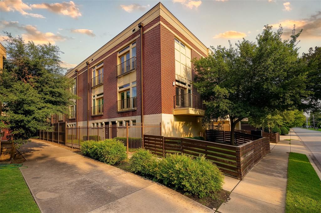 Clean, restrained, and quietly striking, this 3 story residence delivers a refined mid century modern aesthetic with thoughtful, high level upgrades throughout. Set just moments from Lower Greenville, you are within minutes of some of Dallas’ best restaurants, coffee shops, and nightlife, offering a true walkable, lifestyle driven experience. The 1st level offers a private entry and dedicated laundry space, creating a functional and well organized foundation before the home opens up above. On the 2nd floor, the layout unfolds into a bright, open living environment anchored by a fully reimagined kitchen. Crisp quartz countertops and a full height backsplash create a seamless, gallery like backdrop, complemented by under cabinet lighting, updated pendants, and a sculptural farmhouse sink with Kohler fixtures. Custom cabinetry additions maximize storage while maintaining clean lines. The living and dining areas feel expansive yet warm, with natural light reflecting off wood floors and soft neutral tones. A beautifully updated powder bath is conveniently located on this level. The 3rd floor is where the home becomes more private and intentional. A flexible landing with newly installed wood flooring offers a quiet transition space, ideal for a gym, office, or reading area. The primary suite is calm and understated, with new French doors bringing in natural light and creating a sense of openness. The bathroom is a true focal point, designed with a mid century modern perspective. A sculptural soaking tub, Pottery Barn vanities, and Kohler fixtures create a spa like atmosphere that feels tailored and timeless. The secondary bedroom functions equally well as a guest retreat or office. Throughout the home, upgrades reflect both design and substance, including a new HVAC system, and custom shades. The result is a residence that feels architectural, refined, and distinctly curated, offering a level of design and livability that is difficult to replicate.