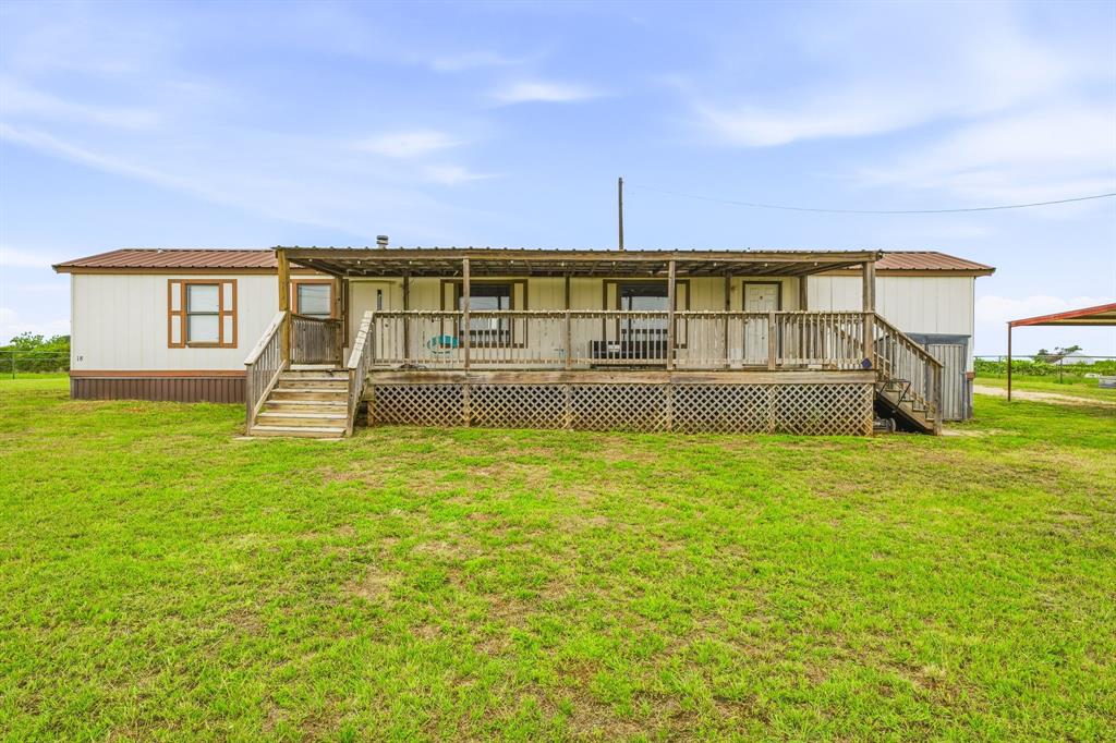 Enjoy peaceful country living with this 2 bedroom, 2 bathroom single-wide mobile home situated on 6.89 beautiful acres. This property offers the perfect blend of comfort, space, and functionality—ideal for a college student, small family, or anyone looking for room for animals and outdoor living.
The home features a practical layout with two bedrooms and two full bathrooms, providing privacy and convenience. Step outside and relax on the large covered back porch, the perfect spot for enjoying morning coffee, watching sunsets, or taking in the quiet countryside views. The property is well-suited for horse lovers and livestock owners with two horse pens, a pasture area, and a lean-to shelter for animals. There’s plenty of open space for riding, grazing, or expanding your setup. Additional features include RV hookups, making it great for guests, additional living space, or travel trailers.
With nearly 7 acres of land, this property provides plenty of room to spread out while still being manageable. Whether you’re looking for a quiet place to study, room for horses, or simply a peaceful place to call home, this property checks all the boxes.
