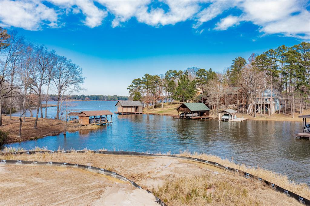 Discover a rare opportunity to own 6 beautiful acres on Lake Cypress Springs. This stunning waterfront property offers an idyllic setting for your dream home, surrounded by the serene beauty of East Texas. The land features a newly constructed seawall, adding both value and charm to this already exceptional property. Nestled in a tranquil area, this property is characterized by lush woodlands, offering a picturesque backdrop for any residential development or recreational pursuit. This plot is perfect for those seeking a peaceful retreat. This unique offering is a must-see for discerning buyers looking for an exclusive piece of land to develop their vision. There is a new 300 foot seawall and the cove is a very deep, dredged cove.