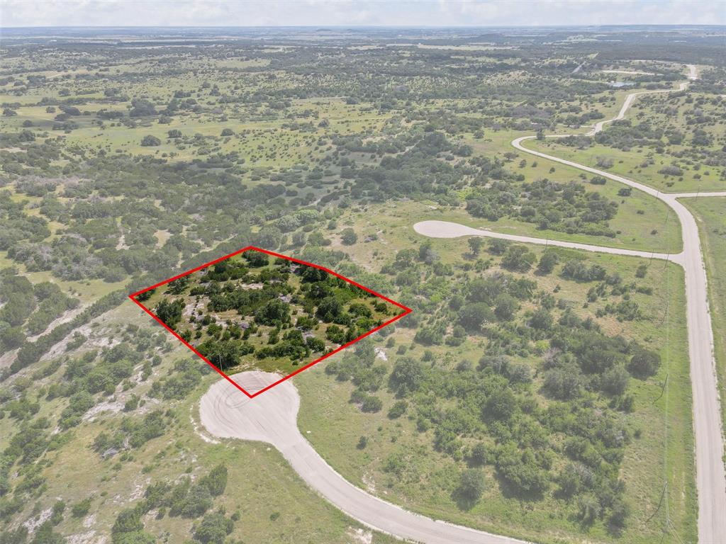 A perfect opportunity to build your forever home in one on the newest residential subdivisions in Somervell County! Your new location in the Hidden Valley Ranch offers acreage lots with beautiful views of the Texas hill country and downtown Glen Rose. Wonderful views of the hill country and is nestled on over 2 acres has beautiful trees, electric service, paved streets, and fiber internet available. Your new gated subdivision will include a community park, pavilion, grills, picnic tables, a pond, and calm walking trails. Close to eateries, shopping, and major attractions, this lot is perfect for family living or a great vacation home!