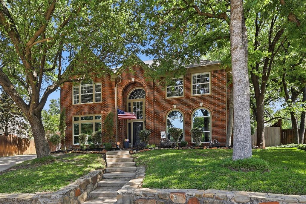 Pristine home tucked away on a heavily treed cul-de-sac lot in highly sought after Keller ISD. From the moment you walk in you are greeted by soaring ceilings a grand staircase and an open inviting layout that feels both spacious and comfortable. The main living area features warm wood floors a cozy fireplace and large windows that bring in tons of natural light while overlooking the private backyard.

The kitchen is built for both everyday living and entertaining with a large island gas cooktop ample cabinetry and plenty of prep space. It opens seamlessly to the living area making it easy to stay connected whether hosting or relaxing at home. A dedicated study offers the perfect work from home setup.

The primary suite is a true retreat with a spa like bath featuring a frameless glass tiled shower, tub dual vanities and a large walk-in closet. Upstairs you will find a spacious game room along with generously sized secondary bedrooms.

Step outside to a shady backyard surrounded by mature trees ideal for relaxing evenings or gathering around the firepit. Additional highlights include a three-car garage and tankless water heater.

This home offers the perfect blend of comfort space and location all in a quiet established neighborhood. See supplements for a list of upgrades and improvements.
