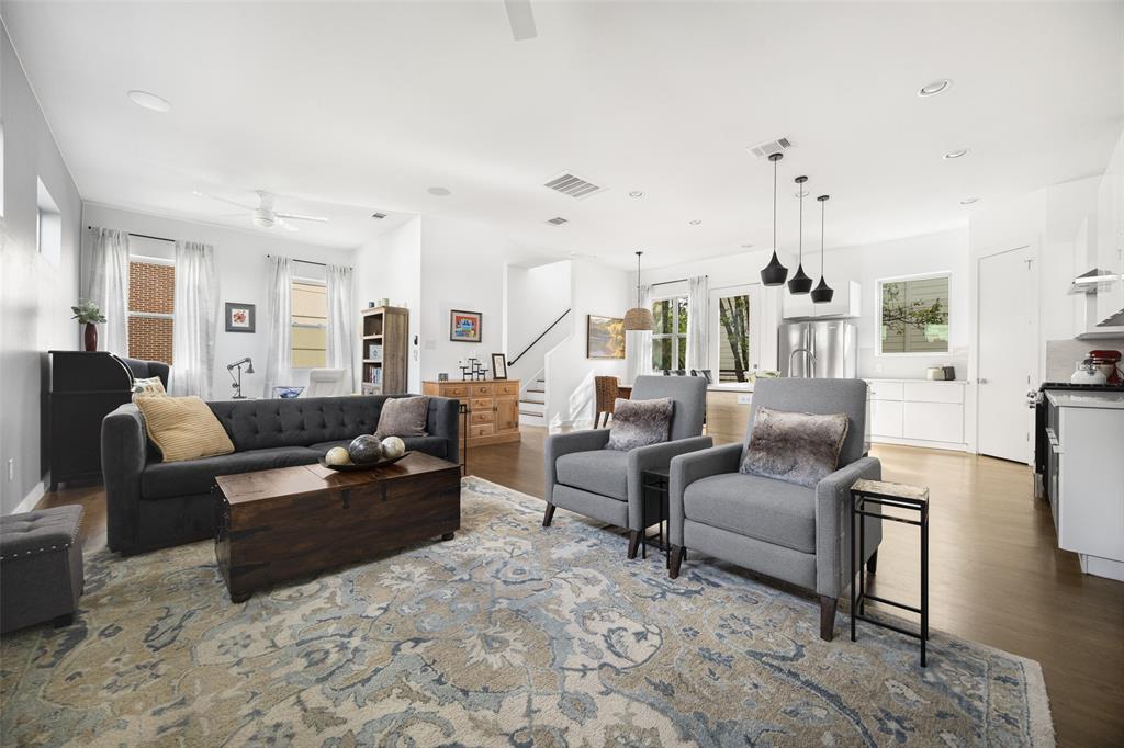 Welcome home to this stunning 3-story corner-unit condo at 5615 Bryan Parkway #D — where thoughtful updates, flexible outdoor living, and an unbeatable location come together in one exceptional package.

This spacious 2-bedroom, 2.5-bath residence offers the feel of a home, with the convenience of condo living. Tucked away at the rear of the property but within easy walking distance to the vibrant Lower Greenville area, this home offers the best of both worlds. Bathed in natural light as a coveted corner unit, you'll enjoy an extra full side of windows, a flexible layout, and quiet privacy that truly sets it apart.

Step inside and notice the beautifully maintained condo with thoughtful updates over the years of ownership. Some of these include, re-sanded and stained hardwood floors, paint with accent walls throughout, remote controlled blinds on high windows, a new dishwasher, and elegant dimmer switches added by a licensed electrician — the kind of details that make a home feel truly curated. The list of updates goes on, reflecting years of pride in ownership.

Outside, enjoy your oversized, L-shaped, private turfed yard — a rare find — complete with electrical already in place for a hot tub and an incredible rooftop with unbeatable downtown views. A balcony off the main level adds a third outdoor space to enjoy, along with an additional private parking space unique to this unit. Whether you're entertaining or unwinding after a long day, this outdoor space delivers. The oversized garage provides exceptional storage and the convenience of a workspace seldom found.

This unbeatable location is in close proximity to Lakewood, Lower Greenville, downtown and is a quick jaunt over to 75, with easy access to many of Dallas's most beloved restaurants, coffee shops, boutiques, and grocery stores.

This one truly checks every box. Don't miss your chance to call it home!