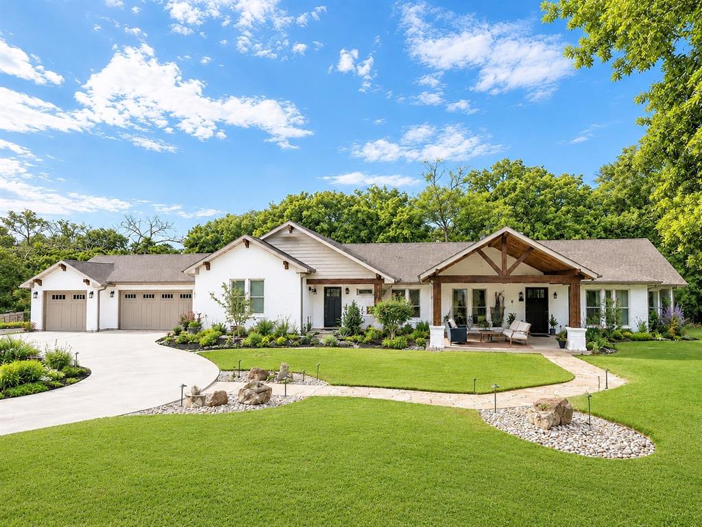 Rare opportunity to own a private estate on 4.99 acres in unincorporated Argyle, featuring approximately 4,478 square feet of combined living space across two private residences. Offering exceptional privacy, versatility, and a lower overall tax burden than many incorporated areas, this one-of-a-kind property was extensively renovated down to the studs around 2014, and the guest house was built during the same transformation. Thoughtfully maintained, the estate adapts to a variety of lifestyles. The approximately 3,150-square-foot main residence is surrounded by mature trees and beautifully landscaped grounds with master gardener touches, creating a peaceful setting. Large front and rear patios, along with the pool, covered pergola, and outdoor kitchen, provide inviting spaces for relaxation and entertaining. Privately tucked away behind its own automatic-gated entrance and long driveway, the separate approximately 1,328-square-foot guest house offers 2 bedrooms, 2 full bathrooms, and a 2-car garage. Naturally screened from the main residence by dense, mature trees, the guest house is ideal for multigenerational living, long-term guests, a private workspace, or investment opportunities. The impressive 30x40 workshop offers exceptional flexibility, with spray foam insulation, a 12-foot overhead door, plumbing, electrical service, and a full bath. A dedicated, enclosed fitness room adds functionality while keeping the workshop area separate for projects and storage. Whether used for a home business, hobbies, recreation, or equipment storage, this versatile space is a rare amenity.
A whole-home generator powers both the main residence and the workshop, offering peace of mind during power outages. The grounds are equally impressive, featuring two automatic gated entrances, long private driveways, a creek along the property's rear, a large fenced garden, lush, mature trees, and room for horses.