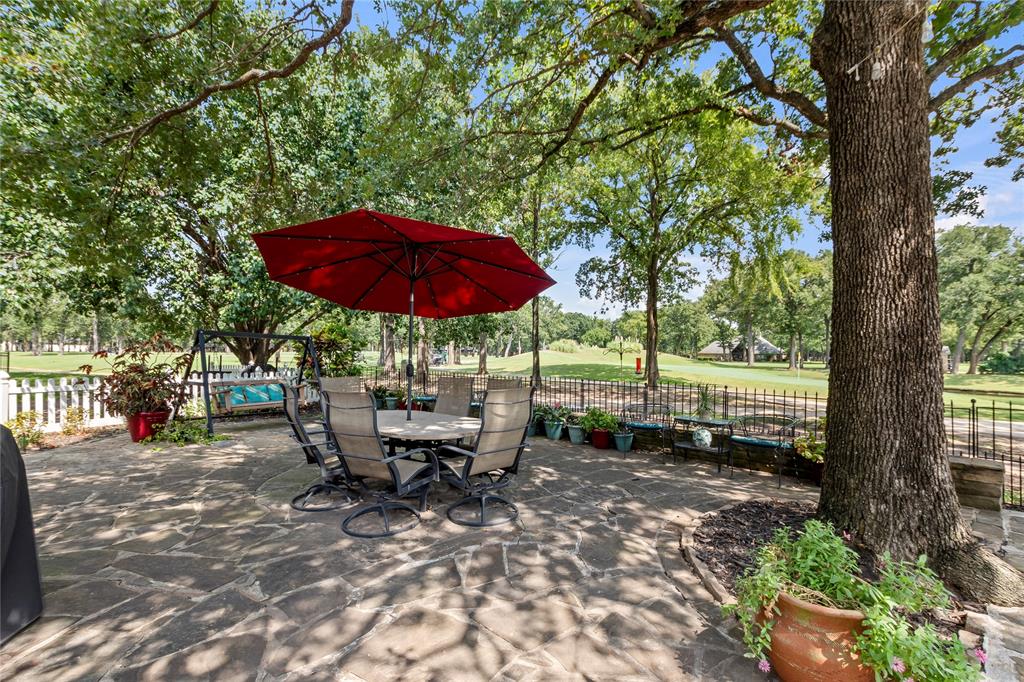 Meticulously maintained golf course home with 180-degree views overlooking the #16 green and #17 tee box in the gated Pinnacle Club community. This open-concept layout connects the kitchen, living, and dining areas, featuring tall ceilings, recessed lighting, and tall windows that fill the space with natural light. Wood-look tile flooring runs throughout the main living areas, with tile in the bathrooms—no carpet anywhere.

The kitchen offers granite counters, a large island with prep sink, double ovens, a lazy Susan, deep drawer lower cabinets, and a nice-sized pantry. A spacious breakfast area overlooks the fairway, and a formal dining room sits just off the entry.

The primary suite includes dual vanities with modern vessel sinks, a garden tub, separate shower, and walk-in closet. The second bedroom has a large closet, while the third functions well as a guest room or office with a built-in Murphy bed system (negotiable). Faux wood blinds are installed throughout.

Updates include: roof and gutters (2024), one HVAC unit (2023), and hot water heater (2024).

Enjoy year-round outdoor living on the screened-in porch with collapsible vinyl windows, plus a flagstone patio offering multiple seating areas to take in the expansive golf course and pond views with fountain. The backyard features removable wrought iron fencing and a gate for direct golf cart access to the course.

The oversized 2-car garage includes a separate golf cart bay, built-in workbenches, and storage cabinets. Attic features floored space for storing seasonal items.

Ownership includes a social membership with access to clubhouse dining, pool, fitness center, tennis, and pickleball courts. Golf memberships available separately.  Pinnacle Marker 146.
