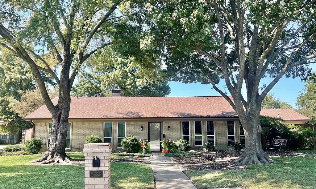NEW PRICE!!!  No HOA!   Wonderful, towering trees shade this beautiful one-story home.  2023, NEW Energy Efficient windows installed, interior doors replaced, recessed lighting, roof replaced, new gas meter, two 2022 AC units, furnace 2022, 2023 water heater, interior paint, French drains around the house, electrical panel replaced & moved, hot tub installed in the backyard  more! The kitchen and baths were updated previously.  The  family room has vaulted ceilings, a beautiful carved fireplace with a custom screen, and huge raised hearth, recessed lighting and built-ins, a game room, perfect for the kids or family movie night. A formal dining room and a formal sitting room or flex room to use as you would like. Master suite is large & offers his & hers closets, separate vanities, jetted tub, walkin shower.  Gardens with beautiful flowers blooming throughout the season. An enormous Cypress tree shades the garden and flagstone pathways leading to the sitting areas, carport, workshop and home.  A bonus for those who are aware of how extreme Texas weather can be, there is a tornado shelter to keep your family safe in case of severe weather.  All written offers will be presented.