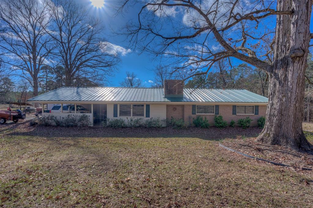 Opportunity awaits with this 3 bedroom, 2 bathroom brick home situated on a slab and resting on a beautiful 5-acre tract in a highly desirable location. The home is in need of updates and fresh paint but offers solid construction, great bones, and endless potential for the right buyer to make it their own.
Adding even more value, the property includes a second dwelling, a 3 bedroom, 2 bathroom mobile home, making this an excellent option for multi-generational living, rental income, or future development.

Owners prefer to sell both properties together; however, they may be sold separately with both transactions closing simultaneously. If sold separately, the brick home will sit on approximately 4 acres, while the mobile home will convey with 1 acre. This is a rare chance to own acreage with multiple living options in a prime location. Contact your agent for pricing details and additional information.