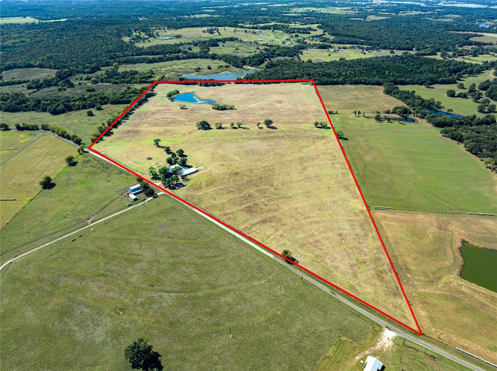 Set across 92.14 acres in Canton, TX, this powerhouse property delivers space, privacy, and serious hosting potential. The 3,904 sqft home offers a solid base for everyday living or weekend getaways, while the pool and open landscape invite outdoor enjoyment in every season. A purpose-built entertainment venue makes it easy to host weddings, reunions, or large-scale events—designed to handle crowds with ease and style. Whether you're expanding your footprint, investing in a multi-use estate, or carving out a private escape, this land gives you the room—and the freedom—to do it your way.
FACTS
- +-92.14 acres of unrestricted land in Van Zandt County
- Located minutes from downtown Canton and First Monday Trade Days
IMPROVEMENTS
- 5 bedrooms, 3 bathrooms residence with spacious common areas
- Landscaped pool area with fencing and lighting for evening events
- Gravel driveways and reinforced parking zones for heavy traffic
- Event space outfitted with power, water, and flexible layout options
- Cleared acreage ideal for expansion, trails, or additional structures
WILDLIFE
- Whitetail deer
- Wild turkey 
- Native songbirds 
- Ducks, herons, and small game

Disclaimer: All information provided herein was acquired from sources deemed reliable and is believed to be accurate. However, we do not warrant its accuracy or completeness and recommend that every item of interest be independently verified by Purchaser.