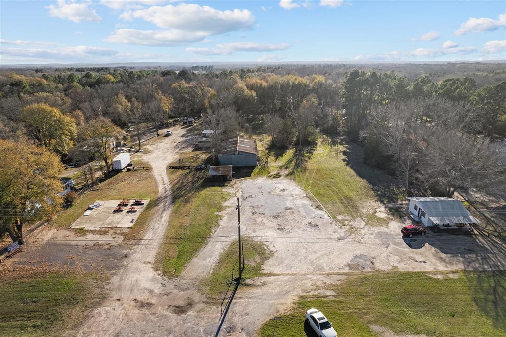 Discover the potential of this commercial lot on a bustling highway in Mineola, TX. Boasting a daily traffic count exceeding 8,000, this0.76-acre lot comes equipped with a substantial 2,200+ square foot metal building and carport. Seize the chance to capitalize on a thriving location with existing infrastructure for your next lucrative venture. Don't miss out on this high-visibility investment opportunity.