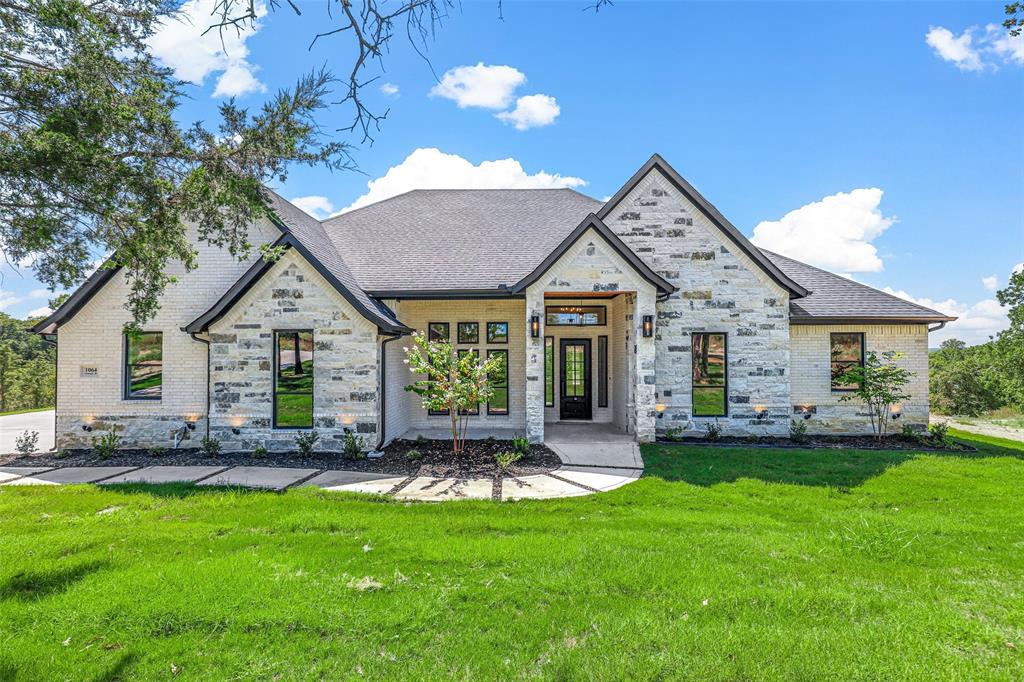 Beautiful newly built home situated on over 2 acres in the peaceful countryside of Weatherford. This spacious single-story residence offers 5 bedrooms, 3 full baths, and an open-concept layout designed for both everyday living and entertaining. The gourmet kitchen features ceiling-height cabinetry, stainless steel appliances, a large waterfall island, and ample storage, flowing seamlessly into the bright living and dining areas.

The private primary suite provides a relaxing retreat with tray ceilings, a spa-inspired bath, dual vanities, soaking tub, separate shower, and a generous walk-in closet. Additional bedrooms are well-sized with flexible space for guests, office, or game room.

Enjoy outdoor living on the covered patio complete with a fireplace and built-in grill, perfect for entertaining while taking in the peaceful surroundings. Additional highlights include a 3-car garage, energy-efficient features, and plenty of room for outdoor activities. Conveniently located near local amenities while still offering the privacy and charm of country living.