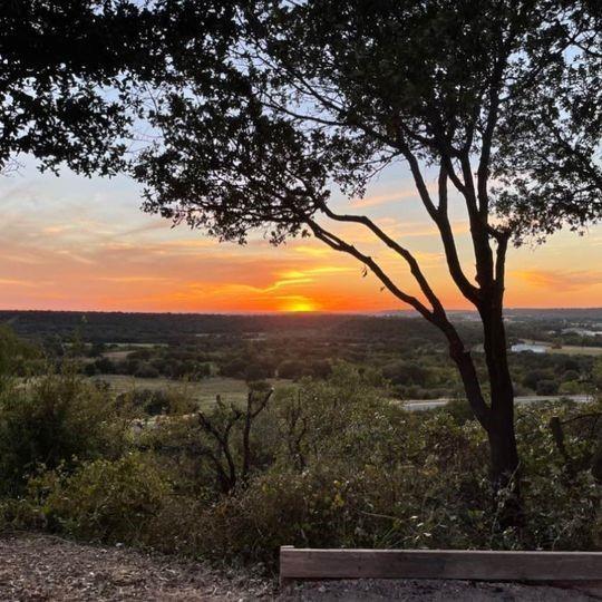 Turnkey RV Park with Scenic Views, Multiple Rental Units & Expansion Potential – Next to Mineral Wells State Park

Rare opportunity to acquire a RV park in a prime location. This income-producing property features 26 full hook-up RV sites, each with 30 & 50 amp service and individually metered electric, allowing for streamlined utility management and tenant responsibility.

Perched on a hilltop, the park offers beautiful panoramic views and direct proximity to Mineral Wells State Park, attracting outdoor enthusiasts, weekend travelers, and long-term guests alike.

Key Features:

26 full hook-up RV spaces (individually metered for electric).

2 bed, 2.5 bath brick home currently leased as a long-term rental.

1,300 SF barndominium apartment generating additional rental income.

1,300 SF of enclosed storage space that could be made into another apartment.

Three fully functional tiny homes, ideal for short or long-term rentals.

One additional tiny home ready for renovation and increased revenue.

City water provided through a rural water supply company.

Septic system in place.

Amenities include a laundry shower room, dog run, community fire pit, grills, and picnic tables.

Sitting on over 9 acres, the property includes 4 acres of undeveloped land, perfect for expanding RV sites, adding cabins, glamping units, or other recreational amenities. There are lots of areas for value add. 

Whether you're looking to grow your hospitality portfolio or operate a profitable lifestyle business in a sought-after Texas location, this property offers strong cash flow and significant upside potential.