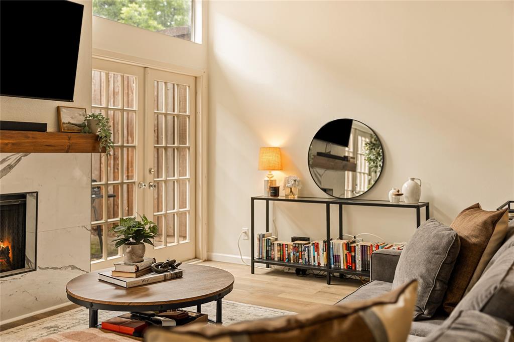 LOCATION. TURNKEY. EFFORTLESS. Beautifully renovated condo in the heart of Oak Lawn, 4015 Holland Avenue combines timeless character with clean, intentional updates and one of the best locations in Dallas. Natural light pours through oversized wood framed double French doors, while tall ceilings and a wood burning fireplace create a space that feels warm, open, and inviting. The kitchen was completely redesigned with custom cabinetry, quartz countertops, and new appliances, complemented by new paint, flooring, and extensive system upgrades including HVAC, electrical, and water heater. The private porch offers the perfect spot to entertain or unwind, while the oversized bedrooms provide a layout that lives comfortably and functionally. Just minutes from Dallas Love Field, Katy Trail, Highland Park Village, and some of Dallas’ best restaurants, coffee shops, and nightlife, this is city living at its best in a location that truly doesn’t get better than this.