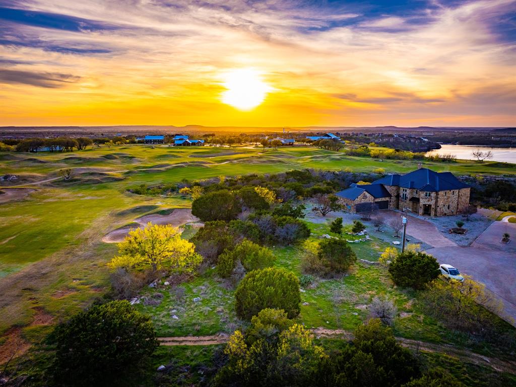 Perfectly positioned on Hole 8 of The Cliffs Golf Course, this exceptional 0.291 acre homesite offers the ideal blend of scenic beauty and premier resort-style living at Possum Kingdom Lake. Enjoy sweeping fairway views, peaceful surroundings, and the opportunity to build your custom dream home in one of the area’s most sought-after gated communities. Residents of The Cliffs enjoy world-class amenities including championship golf, a clubhouse, pool, marina access, and more, making this the perfect setting for a full-time residence or weekend retreat.