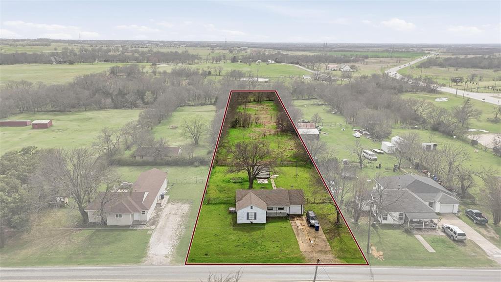 Over one acre ideally located just off the intersection of FM 121 and Preston Road in the rapidly growing community of Gunter. This highly visible and easily accessible tract offers excellent potential for a variety of commercial uses. Previously utilized for residential purposes, the property is now zoned commercial by the City of Gunter. Recent improvements, including new windows (2018), a new HVAC system (2024), and an updated bathroom (2021), enhance the functionality of the existing structure, making it well-suited for a business, retail, office, or investment opportunity. All utilities are already in place, allowing for a smoother development process and making the property truly ready for your vision. Its strategic location near a major intersection provides strong traffic exposure while still offering convenient access to surrounding communities and continued growth along the Preston Road corridor. Whether you are looking to establish a new business location, expand your current operations, or secure a valuable land investment in a high-growth area, this property presents a rare opportunity in one of North Texas’ most desirable and expanding markets. An additional approximately 7 acres of land is available to the east.