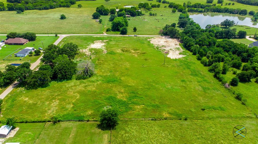 Wonderful 7 acre parcel in sought after location.  This corner tract is fronted on two County Roads ( VZ CR 2813 & VZ CR 2812).  Scattered trees , nice pond ,   water and electric hook ups in place.  With access from two county roads and wide open spaces there are endless possibilities to build your dream or forever home.  Convenient to schools , shopping, restaurants .  Access to Hwy 175 is just minutes away for easy  commutes to Dallas or Tyler areas