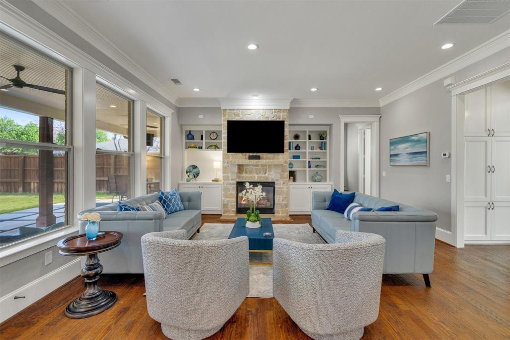 Timeless Preston Hollow Elegance with Transitional Interior Design

Nestled on one of the most desirable and quietly patrolled streets in Preston Hollow, 6811 Deloche Avenue blends classic architectural presence with fresh, transitional interiors designed for modern living.

The striking stone and brick façade, steep rooflines, and manicured lawn create a refined first impression that reflects the established character of the neighborhood. Inside, light-filled spaces, clean lines, and curated finishes offer a sophisticated yet comfortable aesthetic.

The first floor is designed for entertaining and everyday ease, featuring a formal dining room, private study, expansive living area with stone fireplace, and a chef’s kitchen anchored by a generous island and professional-grade appliances. A guest suite with en-suite bath is thoughtfully positioned on the main level for visitors or extended stays.

Upstairs, the private Owner’s Retreat anchors the second level, accompanied by two additional bedrooms and conveniently located laundry, creating a well-organized bedroom wing. A separate staircase leads to an additional retreat space—ideal as a game room, junior suite, media lounge, or private office—offering flexibility for evolving needs.

This layout is ideal for buyers seeking defined bedroom separation, privacy, and versatile living zones.

Situated in one of Preston Hollow’s most prestigious pockets,  this home represents exceptional value for location, design, and livability.
