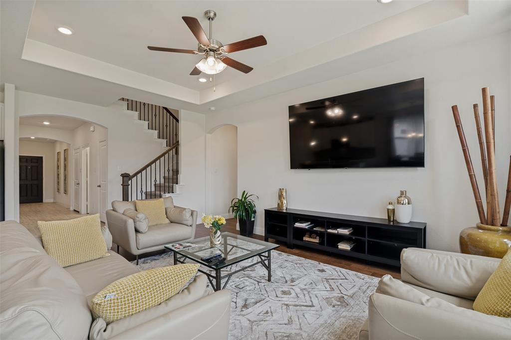 Welcome to 408 Patterson in the highly sought-after Woodcreek community of Fate, Texas. This beautifully maintained 4 bedroom, 3 full bath home offers a spacious and functional floor plan designed for both everyday living and entertaining. With generous living spaces, abundant natural light, and versatile room layouts, this home provides the perfect balance of comfort and convenience.

The open-concept kitchen overlooks the main living area, creating an inviting space for gatherings with family and friends. The primary suite serves as a private retreat with an en-suite bath and ample closet space, while the additional bedrooms and full baths offer flexibility for guests, home office needs, or multi-generational living.

Situated in one of Fate's most desirable master-planned communities, residents enjoy access to Woodcreek's exceptional amenities. The community features a state-of-the-art fitness center, a beautifully appointed clubhouse, a splash park, and a junior Olympic-size swimming pool perfect for cooling off during Texas summers. Outdoor enthusiasts will appreciate the scenic nature trails, while the North Amenity Center offers basketball courts and additional recreational opportunities. Community events and family-oriented activities throughout the year help create the vibrant lifestyle Woodcreek is known for.

Conveniently located near schools, shopping, dining, and major commuter routes, this home offers the perfect combination of small-town charm and modern convenience. Don't miss the opportunity to make this exceptional Woodcreek property your forever home.

Schedule your private showing today and experience all that 408 Patterson Drive and the Woodcreek lifestyle have to offer.