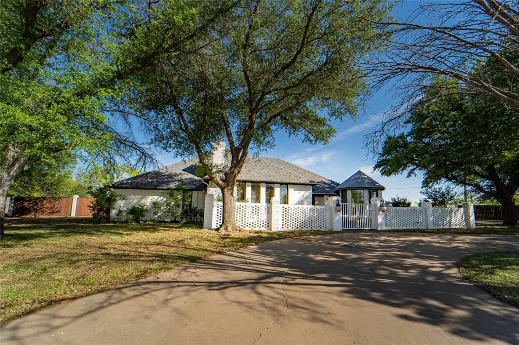 Located approximately 45 miles from Abilene's Lancium Data Center, Breckenridge offers a slower-paced, comfortable lifestyle in a welcoming community. This executive high-end home offers 4,118 sq ft (including garage) and is situated on nearly an acre. 3 bedrooms, 3.5 baths, 2 living areas, and 2 dining areas. Lofted office with abundant built-ins overlooks the den featuring floor-to-ceiling library shelving. Spacious living room offers a wood-burning fireplace. Primary suite includes a sitting area overlooking the backyard, spa-like bath with large walk-in shower and jetted tub enclosed together, dual vanities, and oversized walk-in closet. Guest bedrooms share an adjoining bathroom for added convenience. Kitchen is well-equipped with double ovens, downdraft cooktop, two dishwashers, and tray ceiling, opening to an octagonal breakfast nook full of character. Amenities include hardwood floors, plantation shutters throughout, decorative lighting, crown molding, Pella doors, Kohler fixtures, and a central vacuum system. 2-car attached garage plus additional 2-car garage at the rear of the property, along with a sizable storm cellar. Sprinkler system present, condition unknown. Total square footage, including garage, is 4,118 per tax assessor.