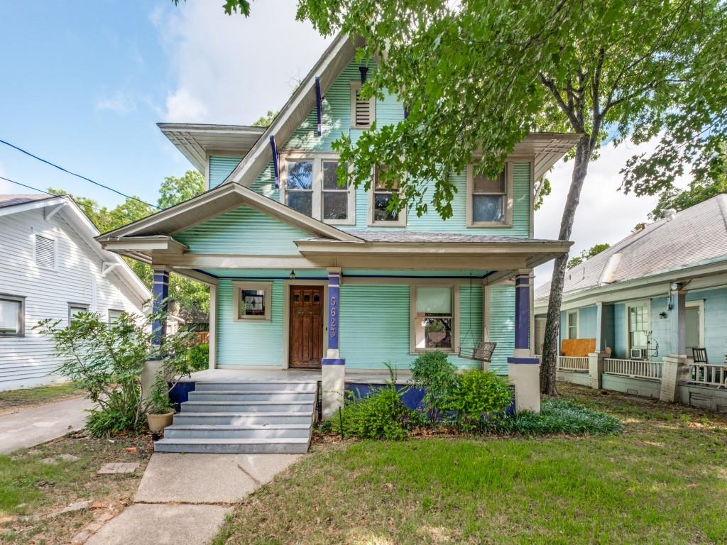 Welcome to this enchanting Queen Anne Victorian gem in a tree-lined Dallas neighborhood. This distinctive two-story home captivates with its charming turquoise exterior, navy accents, and iconic porch instantly transporting you to a bygone era of elegance and architectural charm.
Step inside to discover hardwood flooring, soaring ceilings, and authentic period details throughout. Multiple fireplaces feature ornate wooden mantels with decorative tile work, while original six-panel doors, stained glass transoms, and wainscoting showcase the craftsmanship of early 20th century construction. The kitchen seamlessly blends vintage appeal with modern functionality, featuring rich wood cabinetry, glass-front uppers,  a functional island, and elegant pendant lighting. The main level flows beautifully between living areas flooded with natural light from original wood-trimmed windows. Multiple well-proportioned bedrooms showcase beautiful hardwood floors, ceiling fans, and excellent natural light. The home's versatile layout accommodates family living, home offices, or guest spaces.
An exceptional outdoor oasis awaits with a sparkling swimming pool, charming pool house, mature shade trees, and fenced grounds—perfect for entertaining or relaxation. Positioned in one of Dallas's most desirable historic neighborhoods, this home offers walkable charm, established character, and strong community appeal. Ideal for those seeking authentic period architecture with updated systems and modern conveniences.