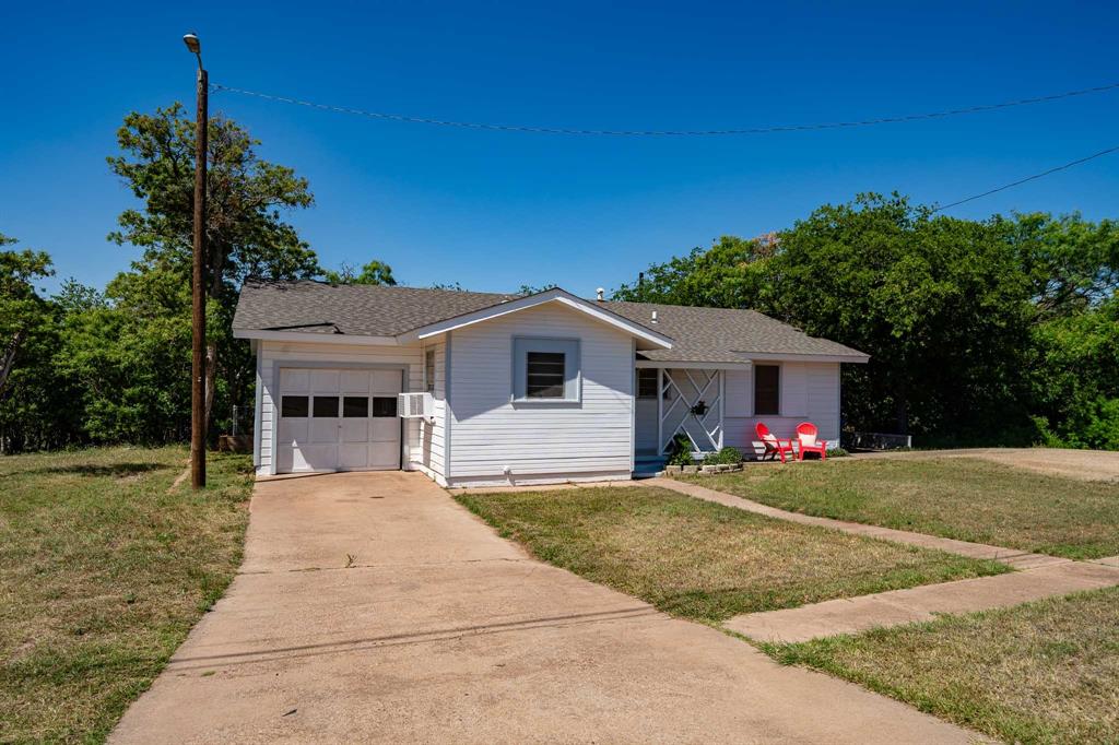 Located in Stamford, home of the Texas Cowboy Reunion, and less than an hour north of Abilene, Texas, this charming property offers an excellent opportunity as a family residence, bed and breakfast, or rental investment with continued growth and workforce demand in the area.

Featuring 3 bedrooms and 1 bath, the home includes a remodeled kitchen with a new kitchen sink, new appliances, and recessed lighting. The interior has been refreshed with new carpet and new LVP flooring, creating a clean and modern feel throughout. The exterior has just been recently painted, giving the home fresh curb appeal.

Sitting on approximately half an acre of land in the heart of town, the property offers a rare combination of space and convenience. The thick mesquite pasture provides a sense of privacy and the unique advantage of having your own land inside the city limits.

Additional highlights include a fenced backyard, perfect for pets and outdoor living, as well as new windows and a new garage door, both coming soon, which will add even more value. This property combines small-town charm, updates, and opportunity, making it a must-see on your next tour.