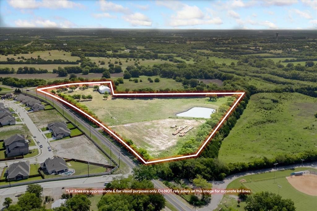 LOCATION, LOCATION, LOCATION!!!!  One of the fastest growing cities in the Metroplex.  Located less than 5 minutes from Downtown Van Alstyne, 
THIS PROPERTY HAS IT ALL!   Water, Electric, 2-20 inch  Sewer Lines and over 1000 feet of Road Frontage  with 2 POINTS OF ENTRY. WHAT MORE COULD YOU ASK FOR?  12 out of the 15 acres is located outside the City Limits and is UNZONED.  This AMAZING PROPERTY is both conveniently located to both McKinney and Sherman. Whether you are a developer looking for property with access to all the utilities including CITY SEWER or you are wanting to locate your business to Van Alstyne....this property has a 6,000 sf shop with 2, 12 foot roll up doors, one of them is built out as a loading dock. Land is has fenced and cross fenced.
 THIS IS A MUST SEE!  Property is AG EXEMPT.  New survey is in documents. INFORMATION PROVIDED DEEMED RELIABLE BUT NOT GUARANTEED.  BUYER MUST DO THEIR OWN DUE DILIGENCE.