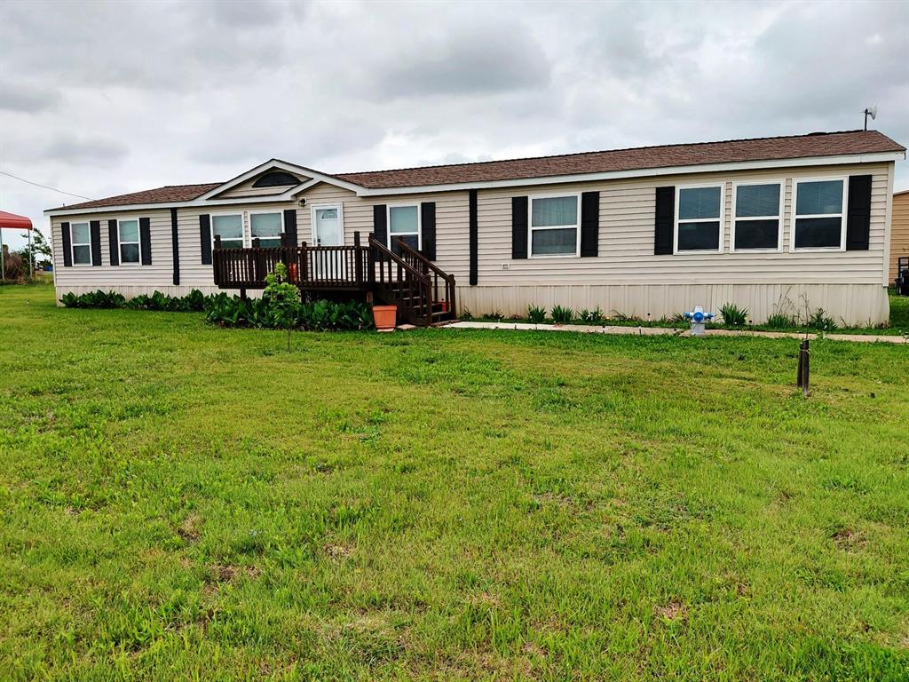This beautiful property has been updated and includes new- skirting, electrical pole, front door and screen, flooring, showers, front, rear decks and railing. This spacious home has two living areas, one with a wood burning fireplace. Maytag appliances. Perfect for families of all types.