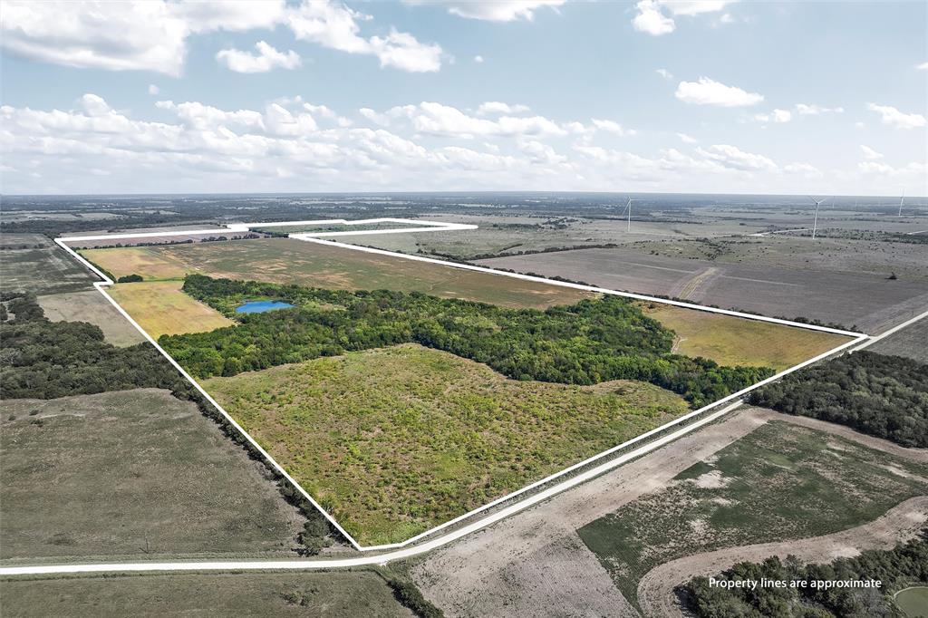 This 416.57 Acre newly surveyed family farm has been in this Family for decades is on the Market.  Cropland, and pasture, woods and open ground should have something for everyone in this tract of land. Good place for families or farmers, cattleman or weekend hunters to enjoy.  Good gravel county road ftg. on 2 sides makes it accessible in all weather and easy to get to most areas of the property.  Three stock tanks have several species of fish for good fishing. The North Fork of Pin Oak Creek, which is a wet weather creek, meanders through the lower portion of the property.  This is a heavily wooded area where the wildlife like to hang out. A portion of the land in the creek area does shows up on the Flood Plain panel as shown on the survey.  The crop land is currently leased with a cotton crop.  Pastureland is leased for grazing.  Very small slice of land is in Hill County, shown on survey. Pipeline across back corner of Tract 2.  Utility easement to Navarro County Electric Coop.