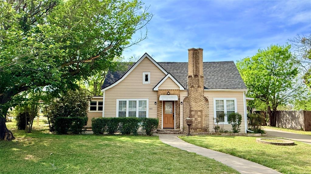 THIS HOME IS ELIGABLE FOR 100% FINANCING, ZERO DOWN USDA HOME LOAN! Charming and full of character, this 3-bedroom, 1-bath Tudor-style home sits on a spacious quarter-acre lot in the heart of Graham. This vintage beauty showcases many original features, including elegant chandeliers, classic doors, unique hardware, and custom cabinetry that highlight its timeless appeal. The home is move-in ready and offers plenty of parking and storage, making it as functional as it is charming. Recent updates provide peace of mind and energy efficiency, including a new shingle roof, updated HVAC system, and solar panels to help keep utility costs down. Make this vintage beauty yours today!