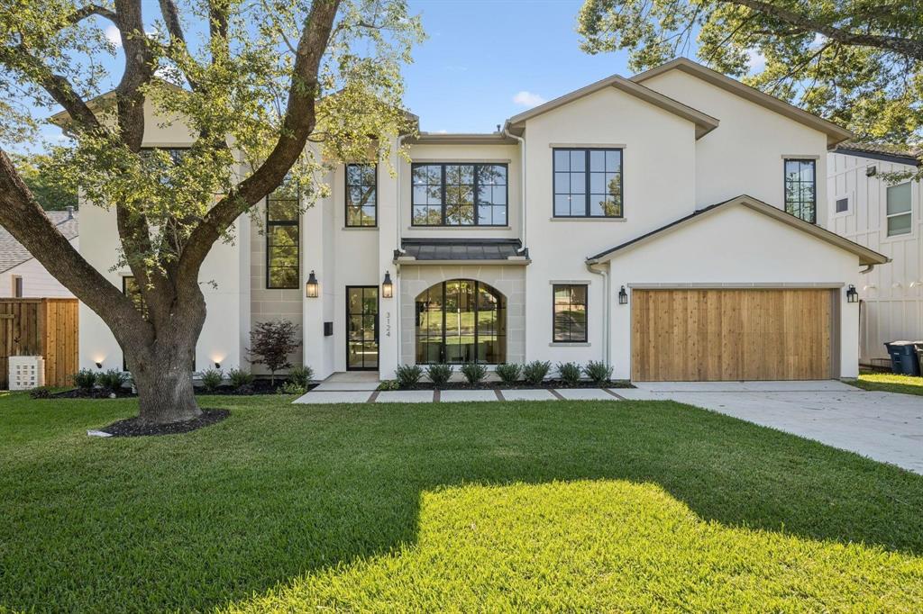 Refined luxury and timeless design define this stunning 5,005 sq. ft. Lakewood residence at 3124 Sperry Street. Thoughtfully designed for comfort and functionality, this home offers 5 bedrooms, 5 full baths, and 2 half baths, including a game room and dedicated pool bath. The open floor plan showcases exquisite craftsmanship with white oak flooring, smooth finish walls, and designer finishes throughout. A spacious family room with a sleek fireplace flows seamlessly to the outdoor living area through sliding glass doors, creating an effortless indoor-outdoor connection. The chef’s kitchen features Wolf and Sub-Zero appliances, honed Mont Blanc quartzite countertops, and a hidden walk-in pantry. The first-floor primary suite offers a spa-like bath, walk-in closet, and sliding doors that leads to the private backyard and pool, while a guest suite provides ideal flexibility. Upstairs, enjoy three en-suite bedrooms, a game room, and versatile flex space ideal for a study, media rooms or gym. Step outside to a resort-style backyard complete with a large outdoor patio featuring a pool bath, outdoor kitchen, and infinity edge pool—perfect for gatherings or quiet evenings at home.