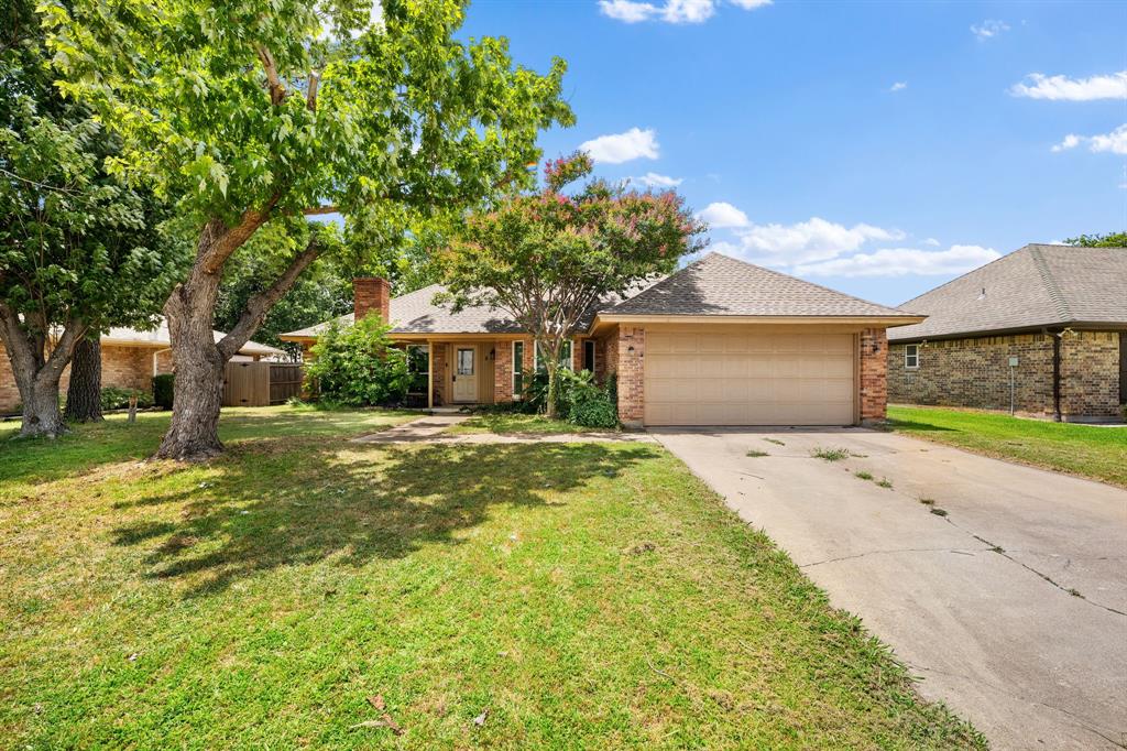 Welcome to 8 Cimarron Dr, a beautifully updated single-story home nestled in the heart of Trophy
Club. This 3-bedroom, 2-bath residence offers a functional floor plan with approximately 1,684
square feet of living space and a thoughtful blend of modern updates and timeless charm.
The spacious living room features a cozy wood-burning fireplace and abundant natural light,
creating a warm and inviting atmosphere. The versatile formal dining room can also serve as a
home office, flex space, or additional sitting area. The kitchen offers granite countertops,