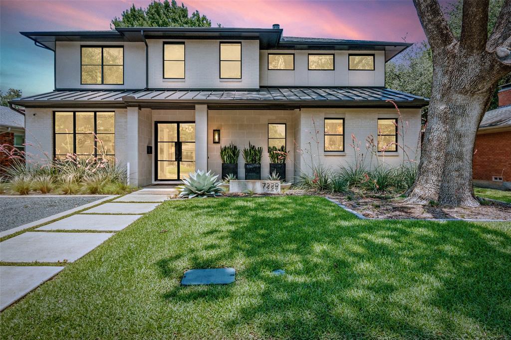 Welcome to 7229 Haverford – a thoughtfully reimagined custom home by Ryan Bozeman Homes.  Built in 2020 and zoned to highly sought-after Lakewood Elementary, this stunning home blends sophisticated design, modern luxury and everyday functionality in one of Dallas’s most desirable neighborhoods. Step inside to find 10-foot ceilings, rich white oak hardwood floors and abundant natural light throughout. The first floor features a dedicated home office or dining room and a beautifully open-concept layout, ideal for effortless entertaining and everyday living.
The chef’s kitchen is a true showpiece—featuring Wolf appliances, a Sub-Zero wine fridge, custom soft-close cabinetry, designer tilework, a custom brass vent hood, pot filler and a dramatic quartzite waterfall island with seating. The kitchen flows into the spacious living room with a custom gas fireplace, built-in cabinetry and high-efficiency windows offering both comfort and energy savings. Enjoy immersive sound with a Sonos system installed throughout the home. Retreat to the luxurious primary suite, complete with a spa-inspired bath boasting dual sinks, a soaking tub, separate shower & a gorgeous custom walk-in closet. The main level also includes two stylish half baths and a functional laundry room with ample counter space and storage. Upstairs, you'll find 3 generously sized BRs - each with walk-in closets & ensuite bathrooms - plus a loft area ideal for a home gym, study zone or creative space. The spacious game room is perfect for movie nights or family gatherings. Step outside to a covered patio overlooking the expansive backyard with raised garden beds - a peaceful setting for outdoor entertaining, grilling or simply relaxing. Every inch of this home reflects meticulous attention to detail, quality craftsmanship and designer finishes. Ideally located near White Rock Lake, scenic parks and trails and all the shopping and dining Lakewood has to offer. Don’t miss this rare gem in the heart of East Dallas!